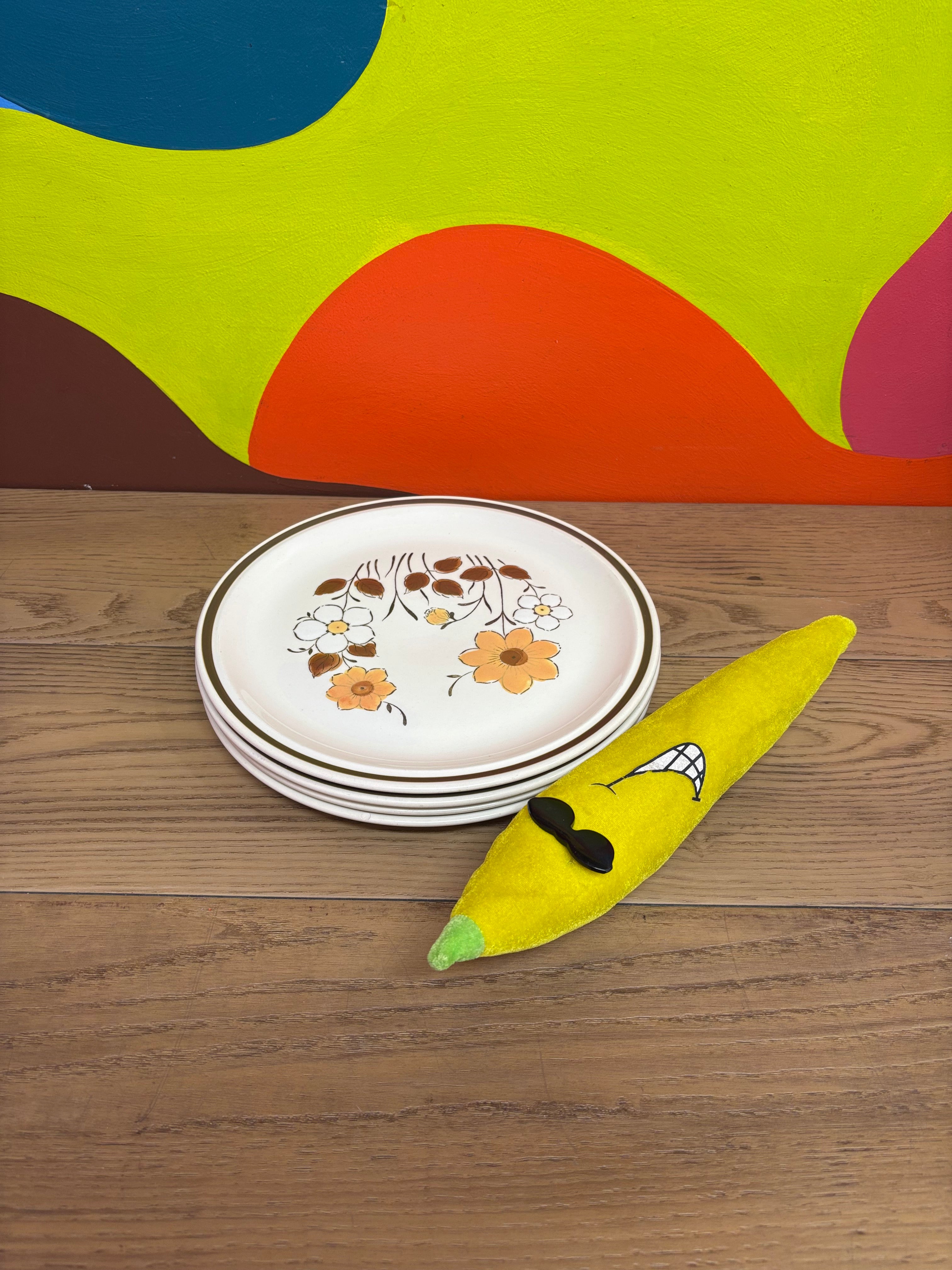 (4) Floral Plates