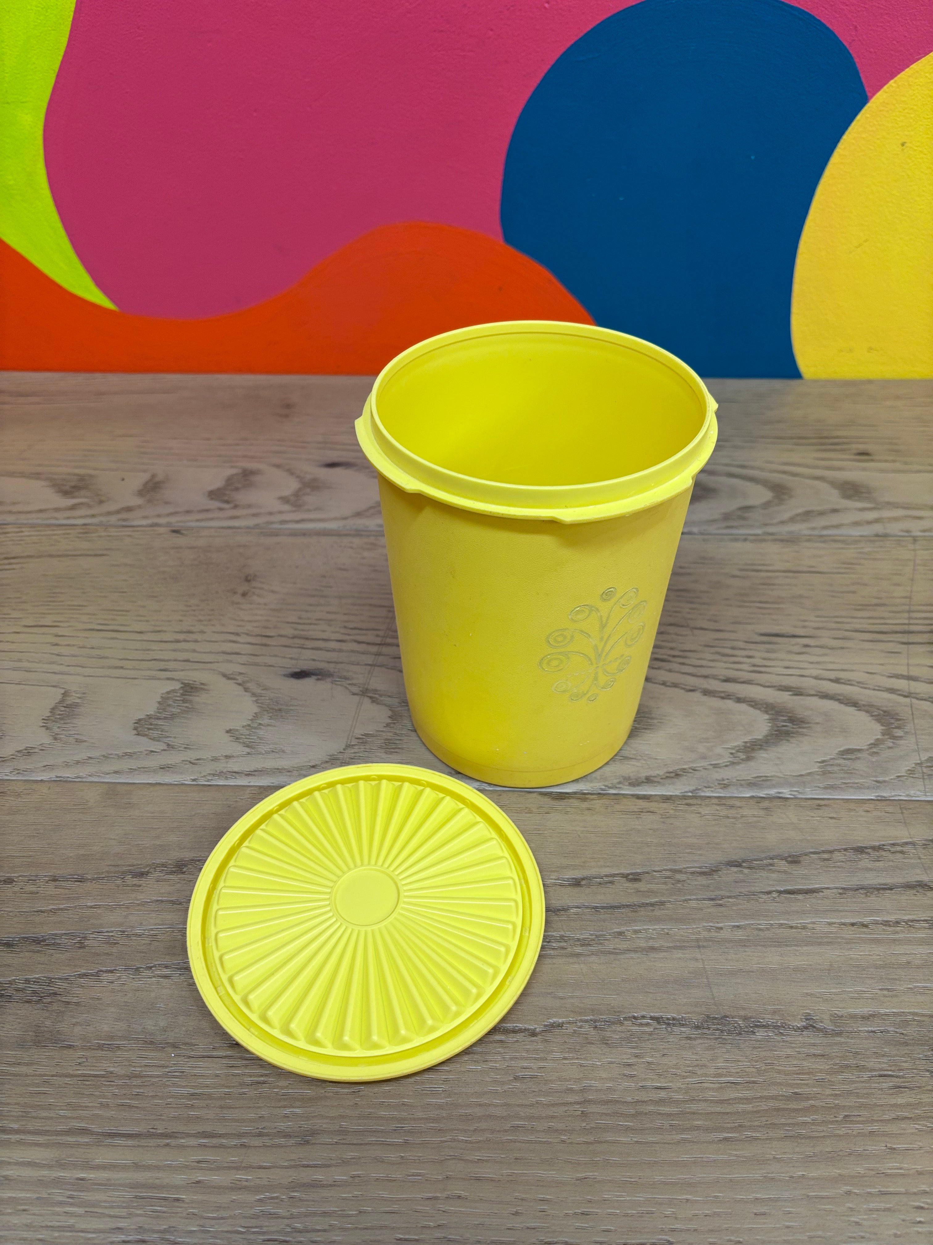 Yellow Tupperware Canister