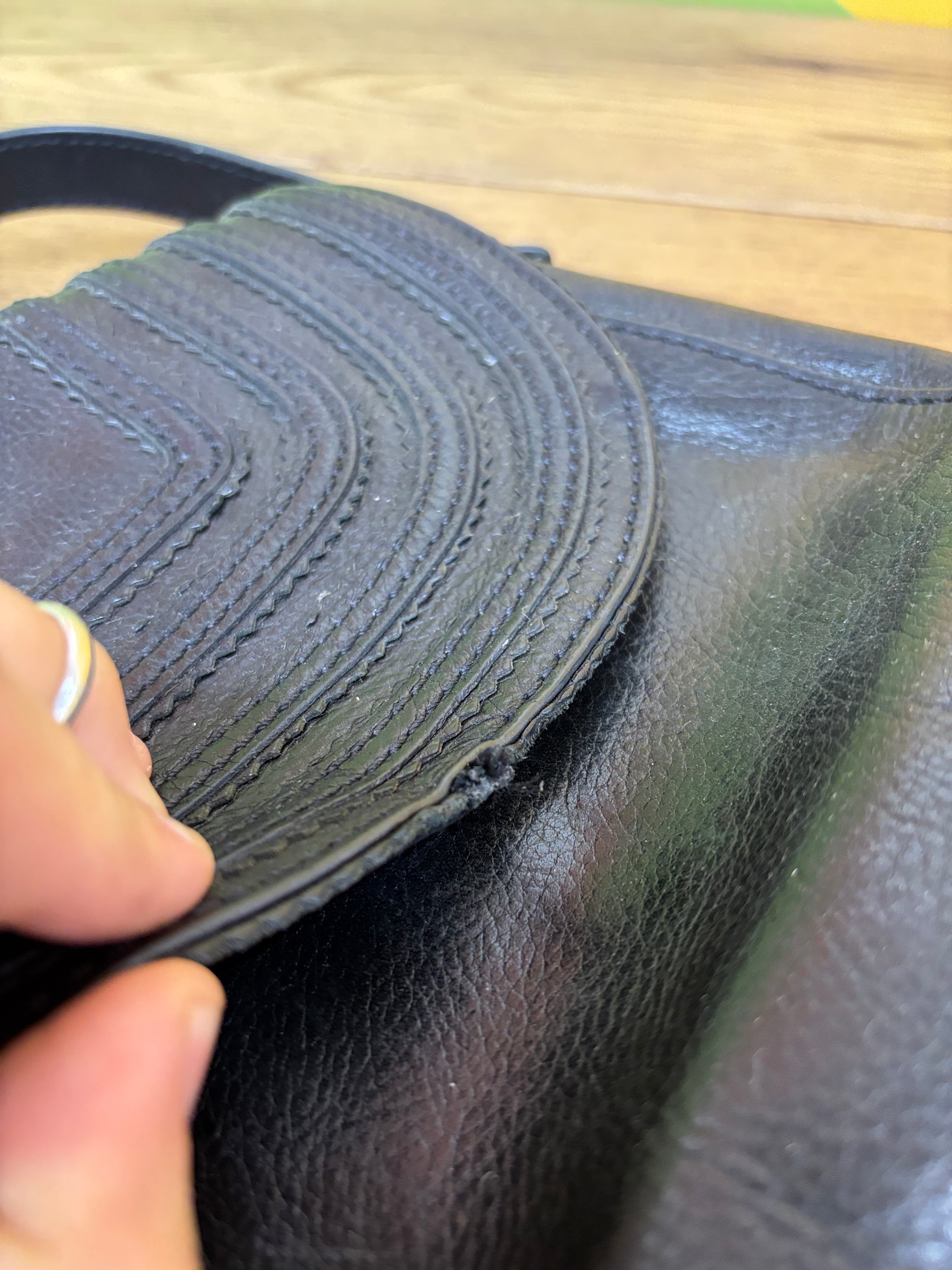 Black Fossil Saddle Crossbody Bag