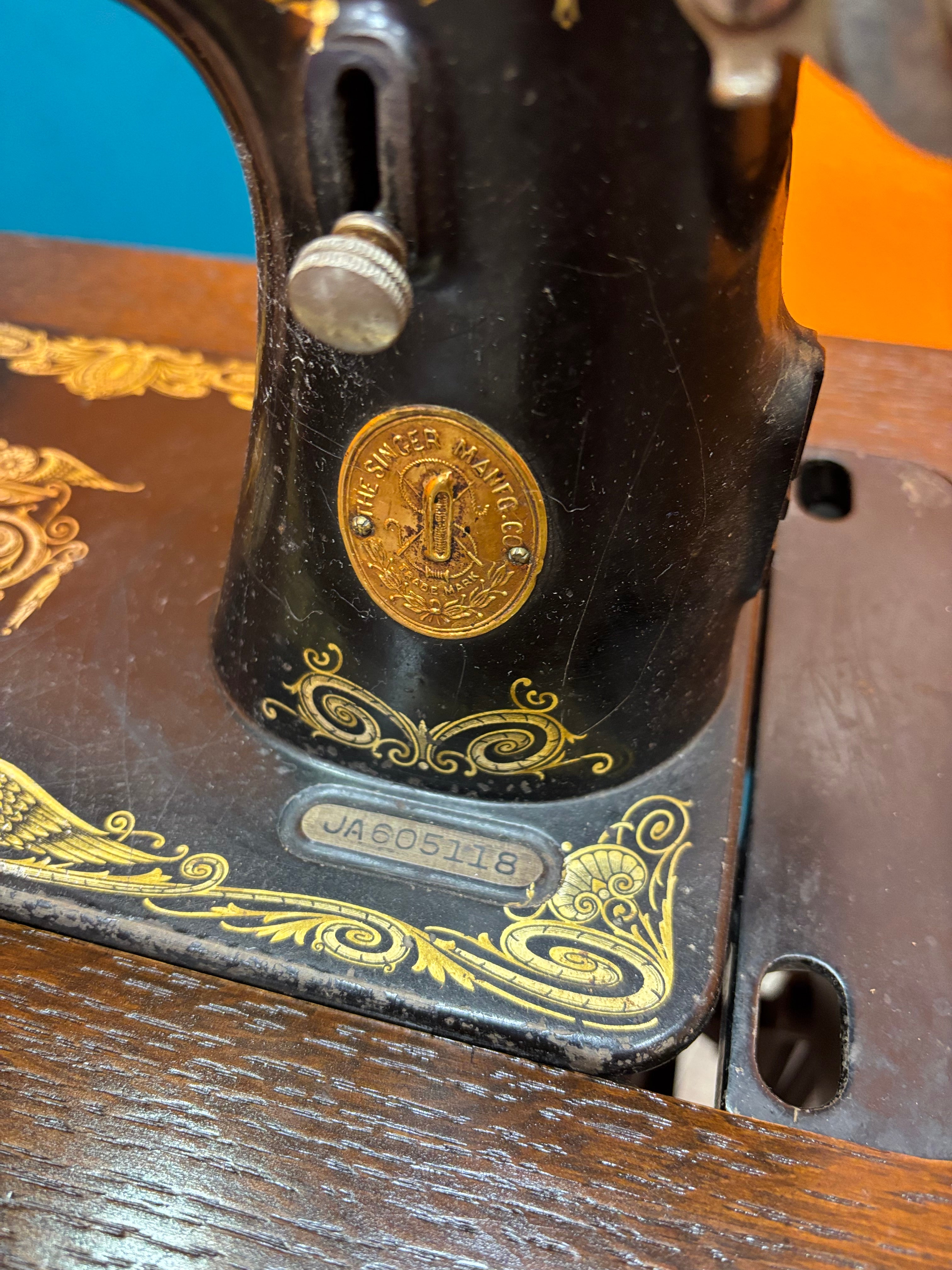Singer Sewing Machine & Cabinet