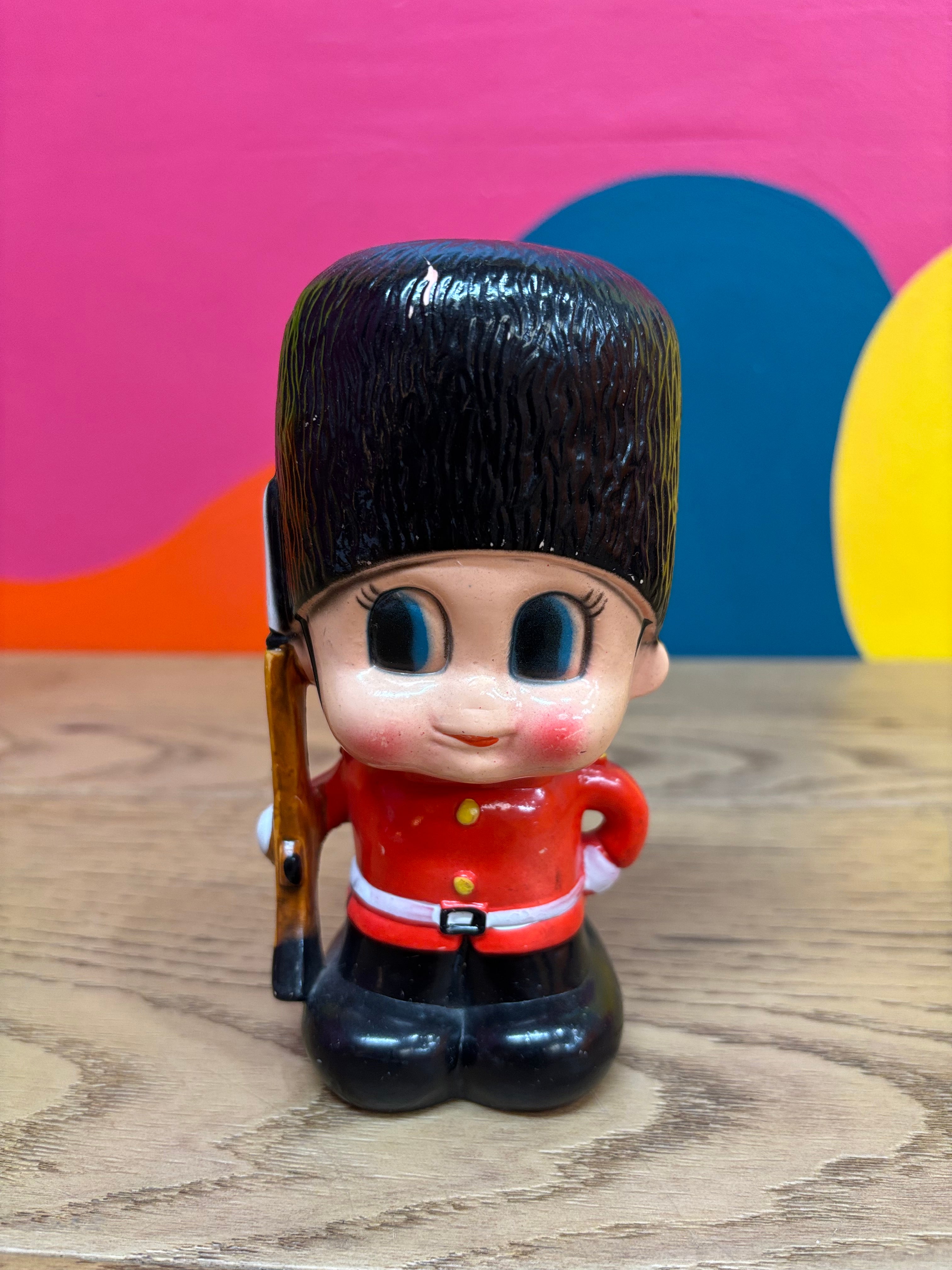 Queens Royal Guard Plastic Coin Bank