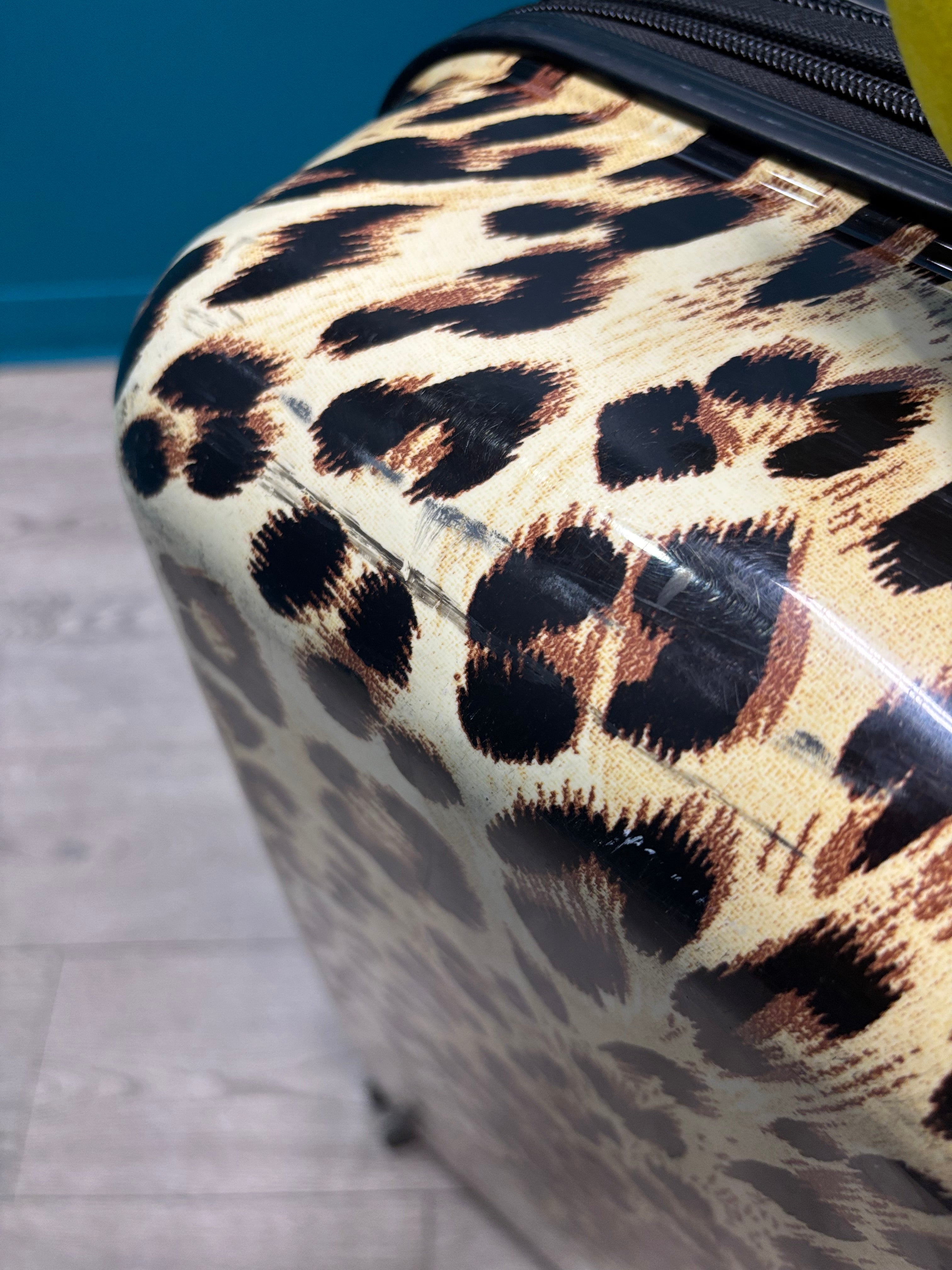 HEYS Leopard Fashion Spinner Luggage