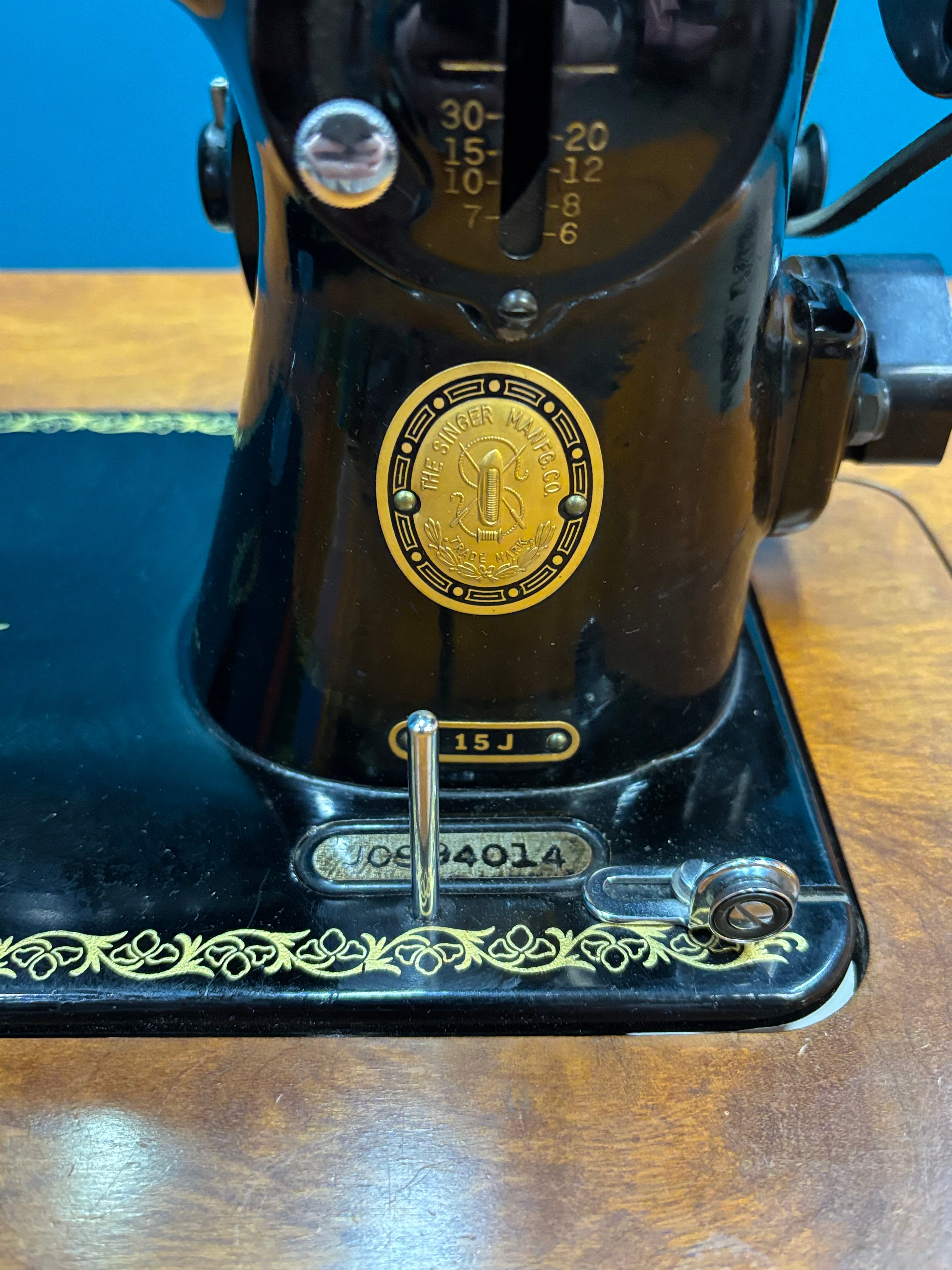 Singer Sewing Machine & Cabinet