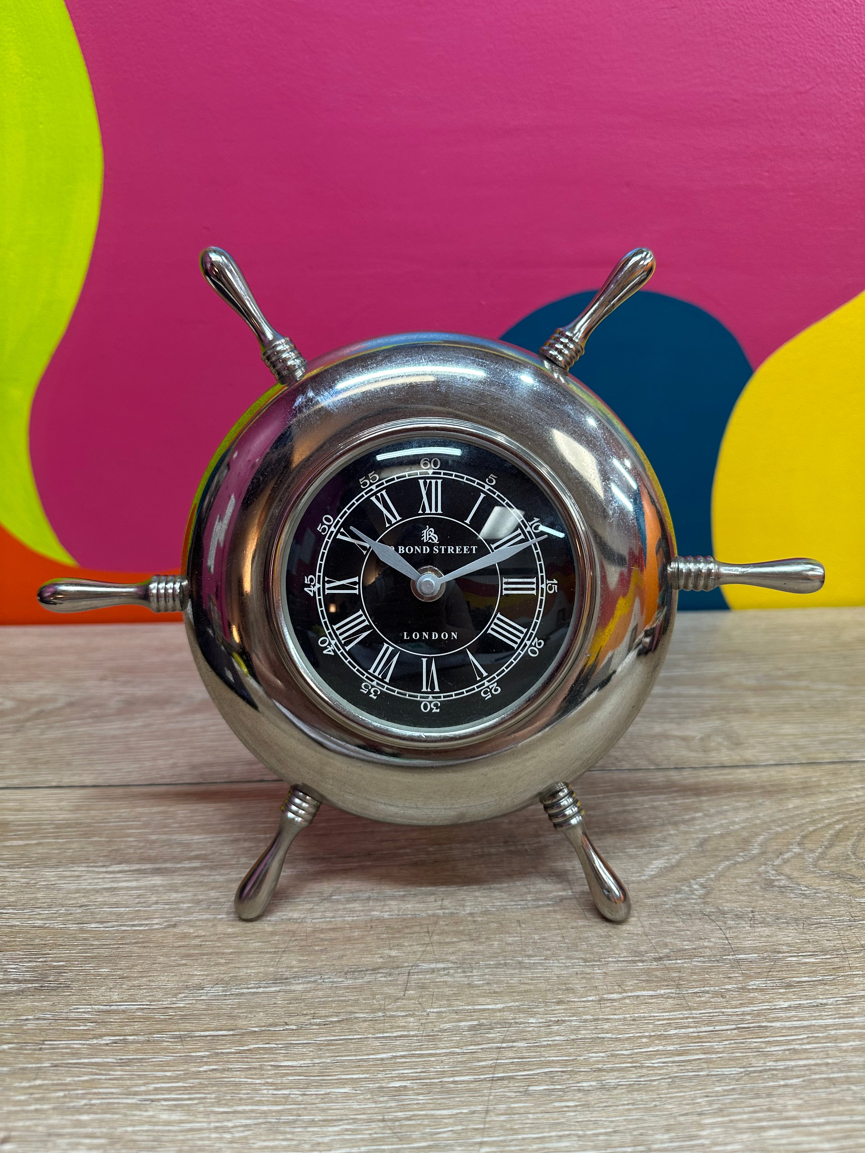 "49 Bond Street" Nautical Wheel Clock