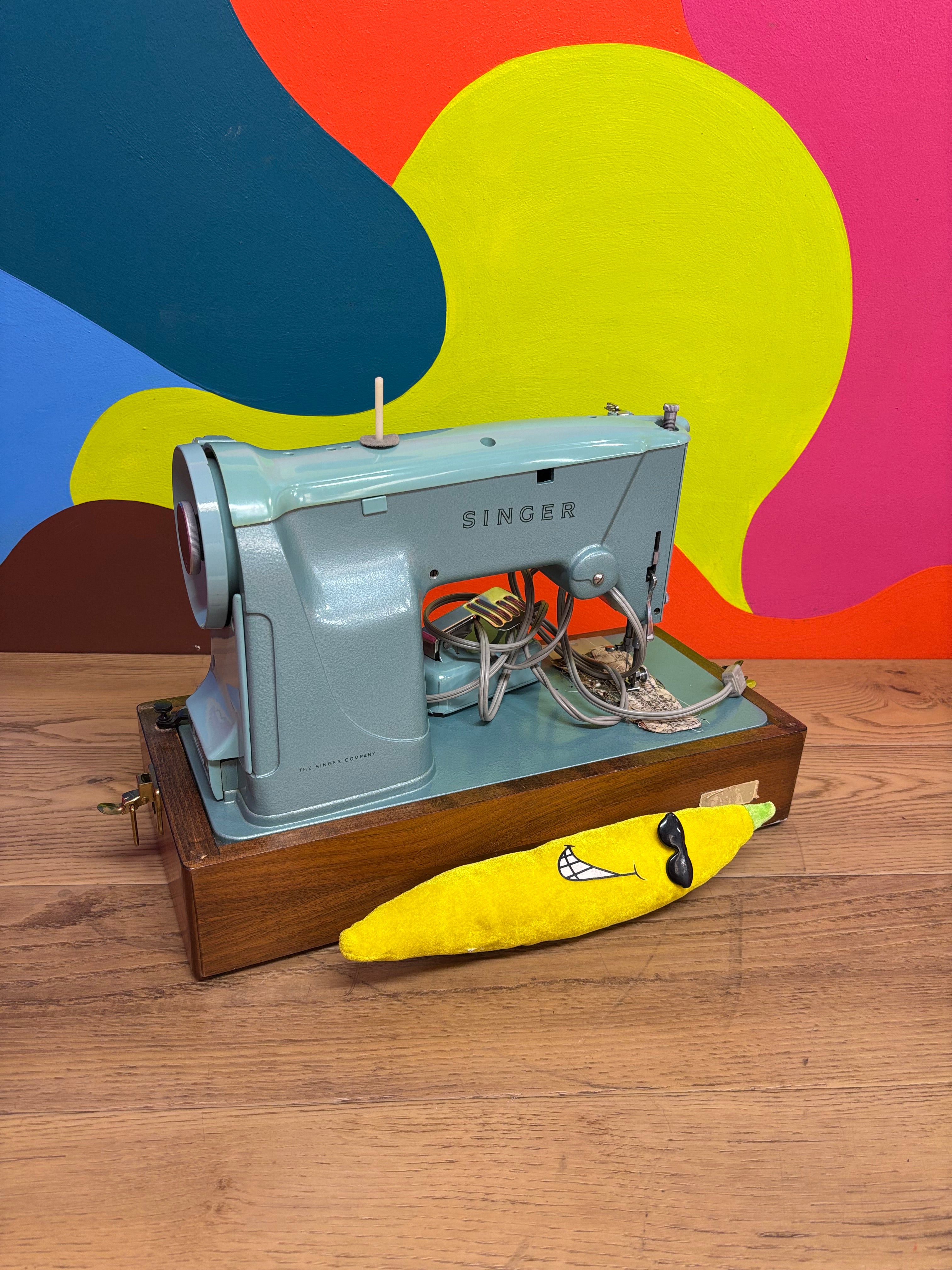 Teal Singer Sewing Machine in Carrying Case