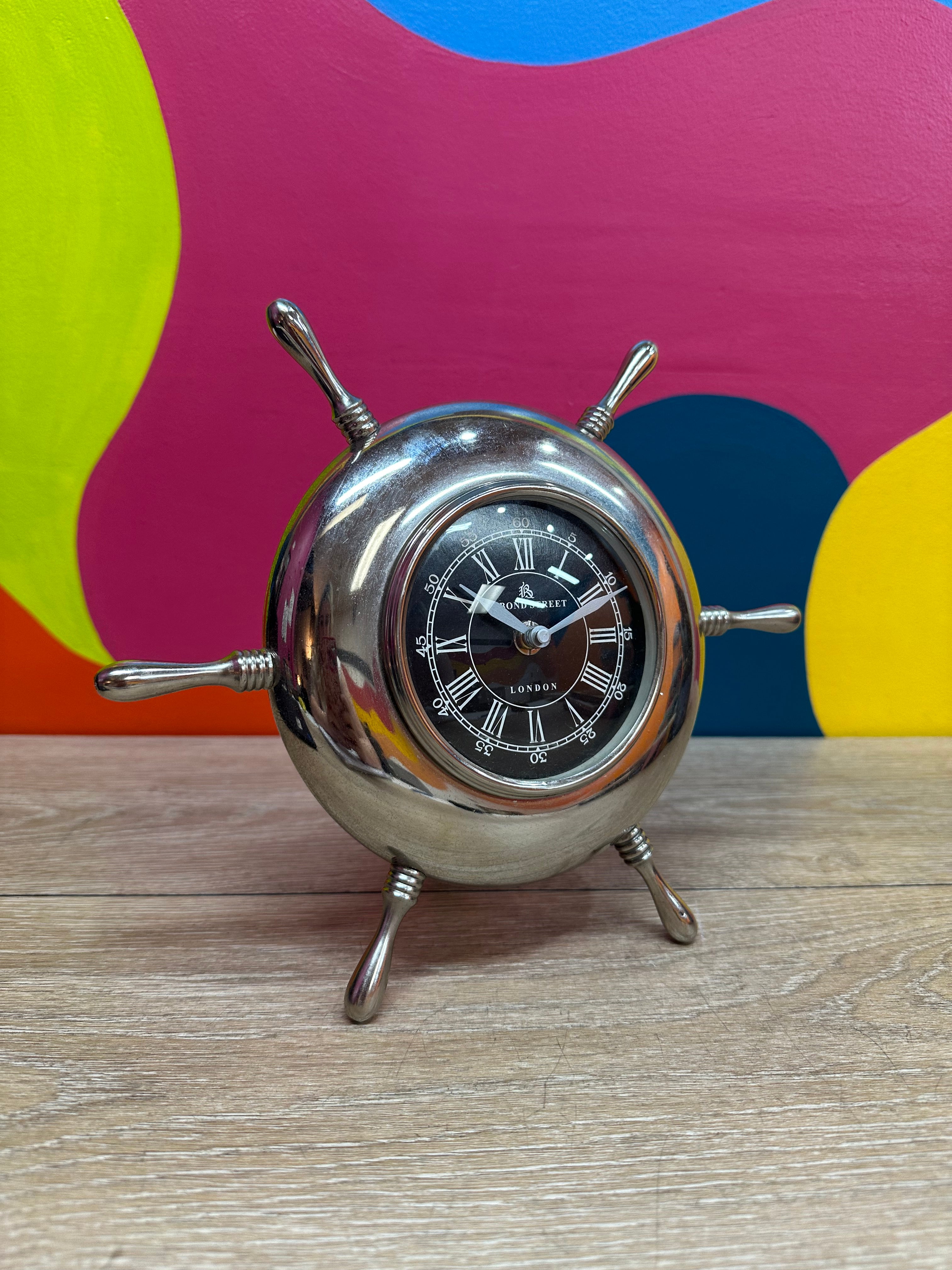 "49 Bond Street" Nautical Wheel Clock