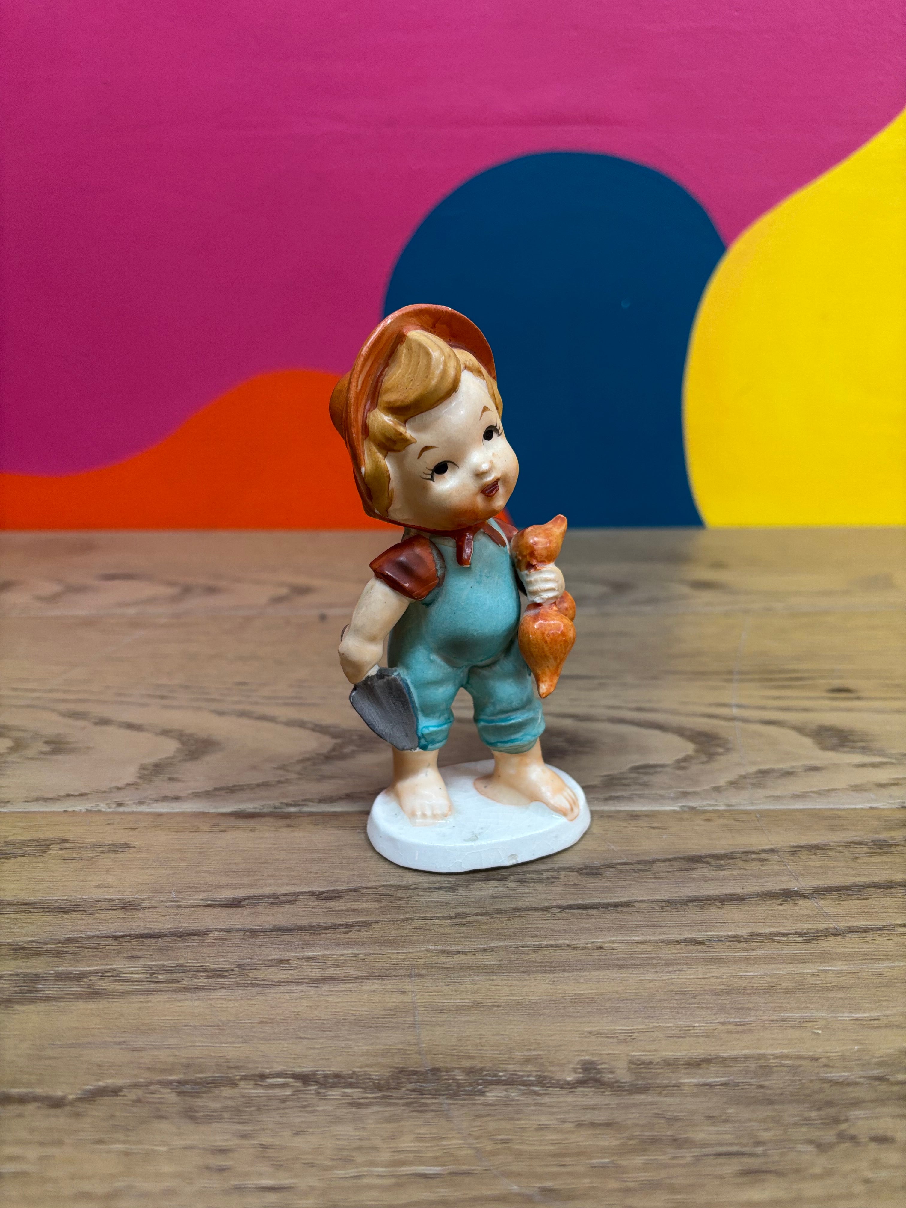 Porcelain Boy Figurine