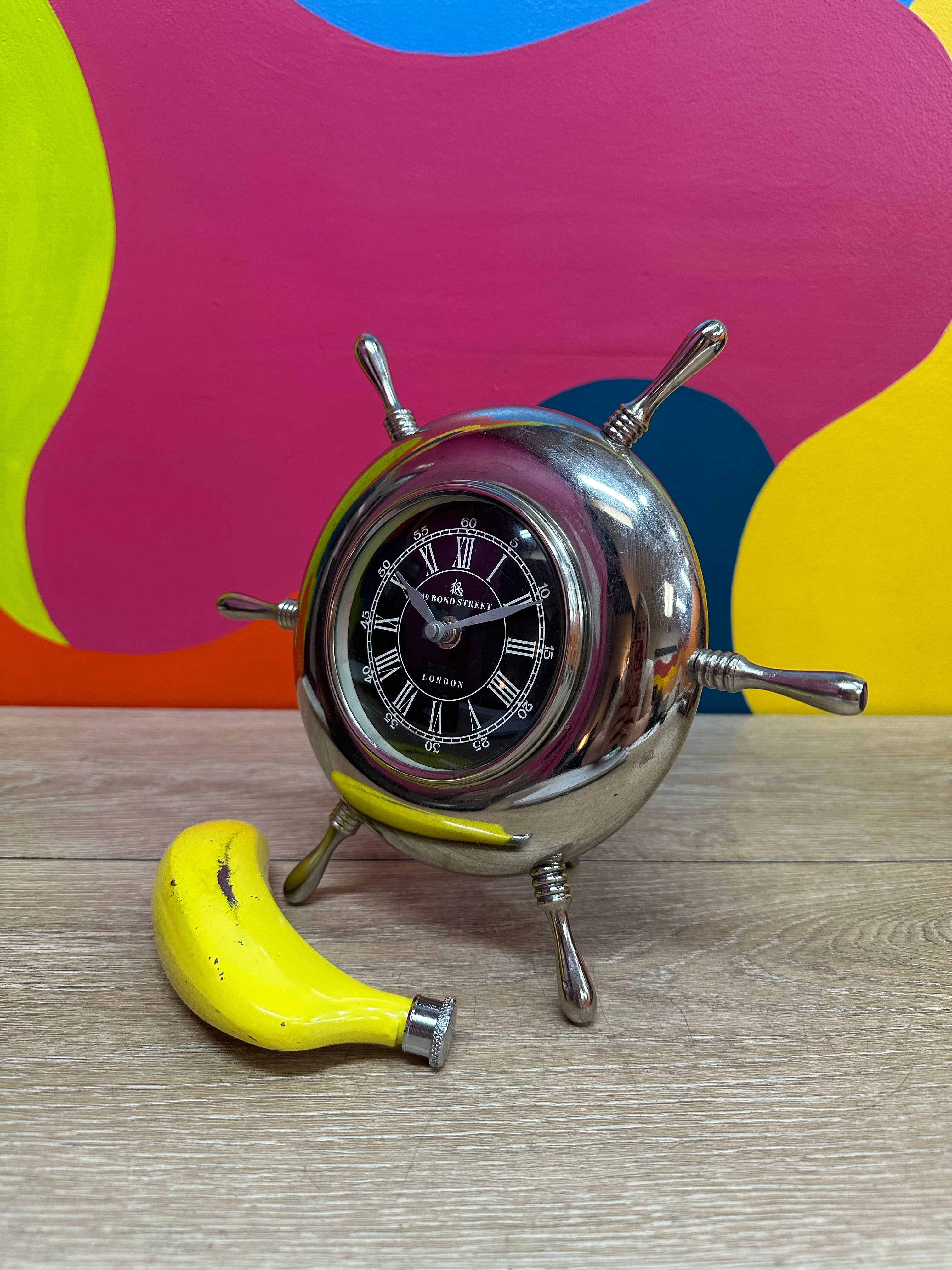 "49 Bond Street" Nautical Wheel Clock