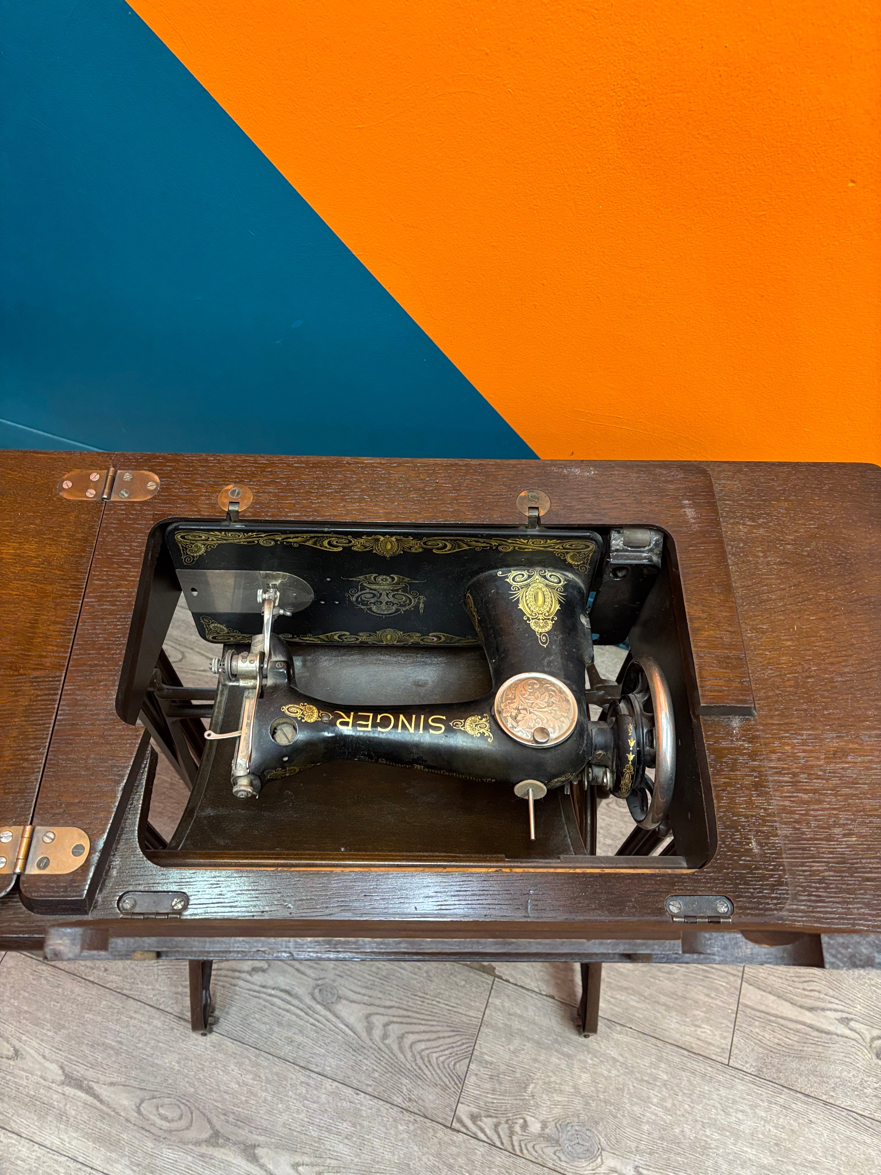 Singer Sewing Machine & Cabinet
