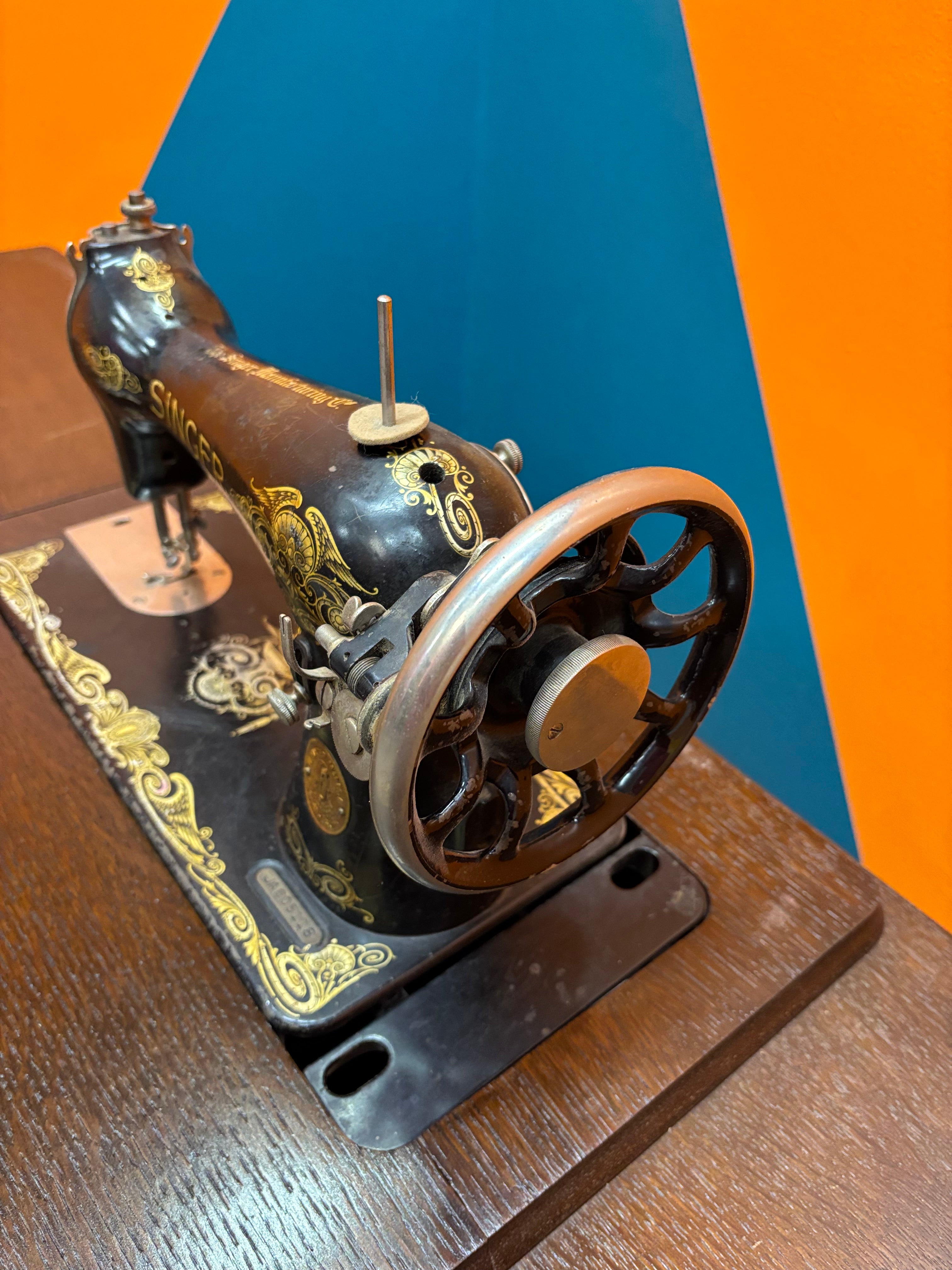 Singer Sewing Machine & Cabinet