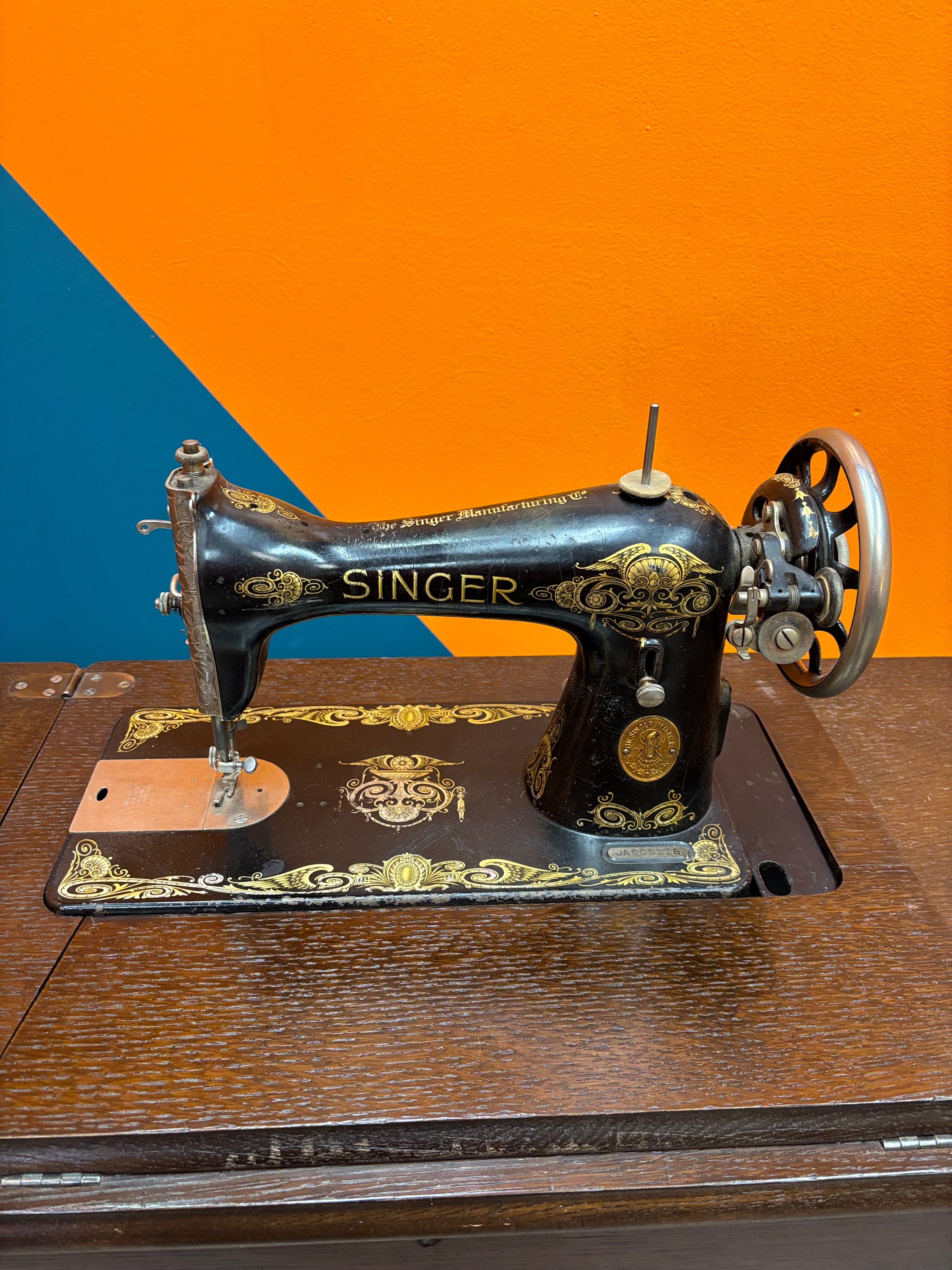 Singer Sewing Machine & Cabinet