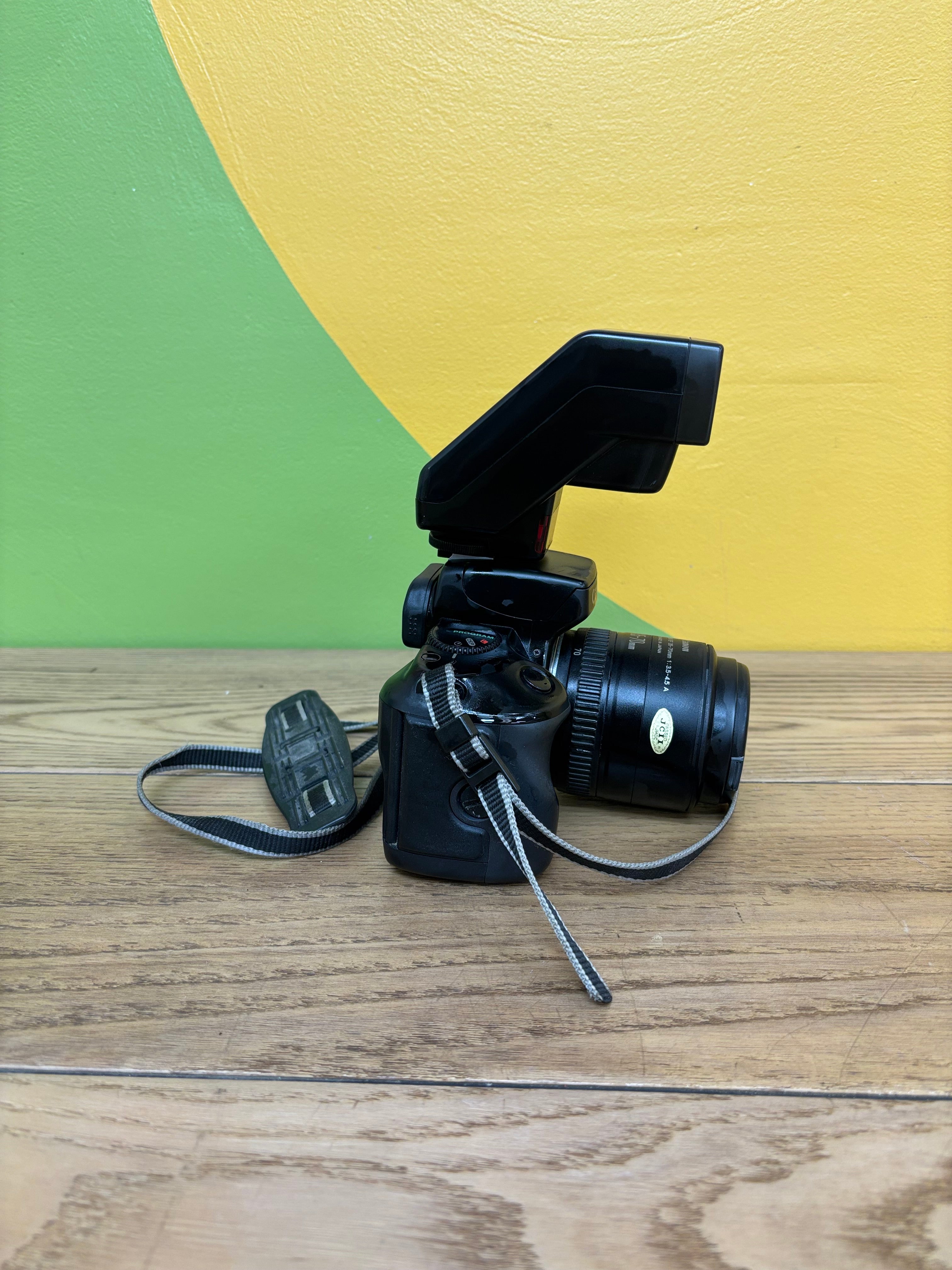 Canon EOS 750 Film Camera with Speedlite 300EZ Attached Flash