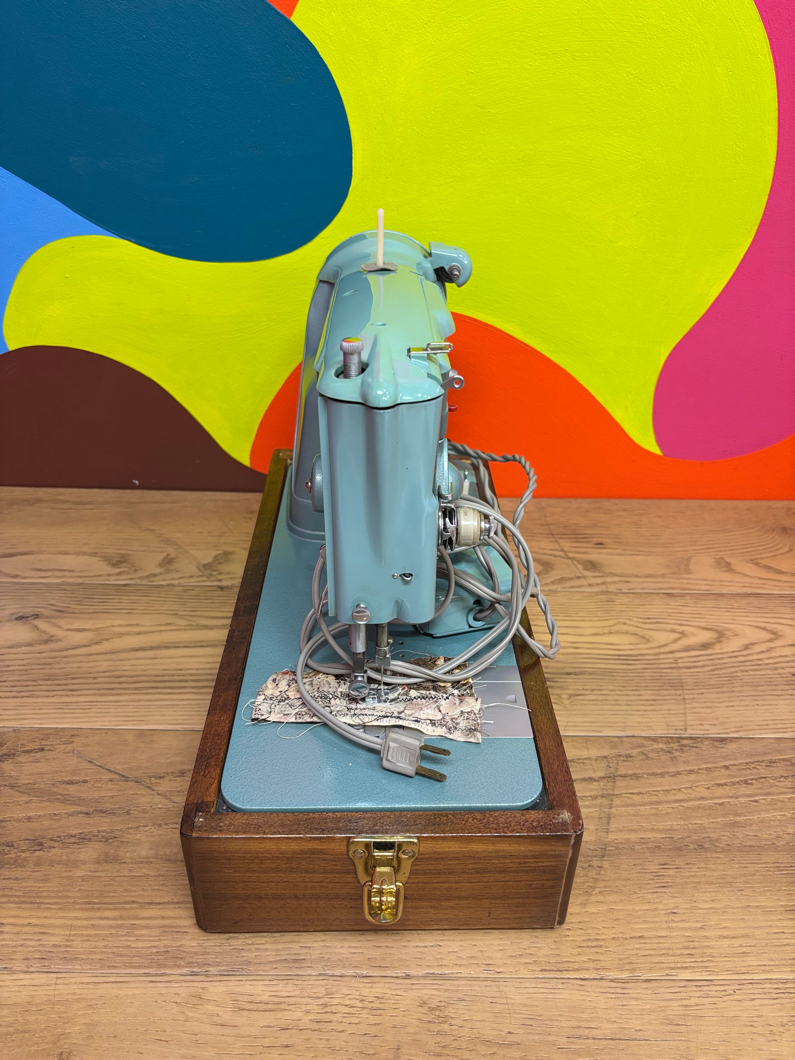 Teal Singer Sewing Machine in Carrying Case