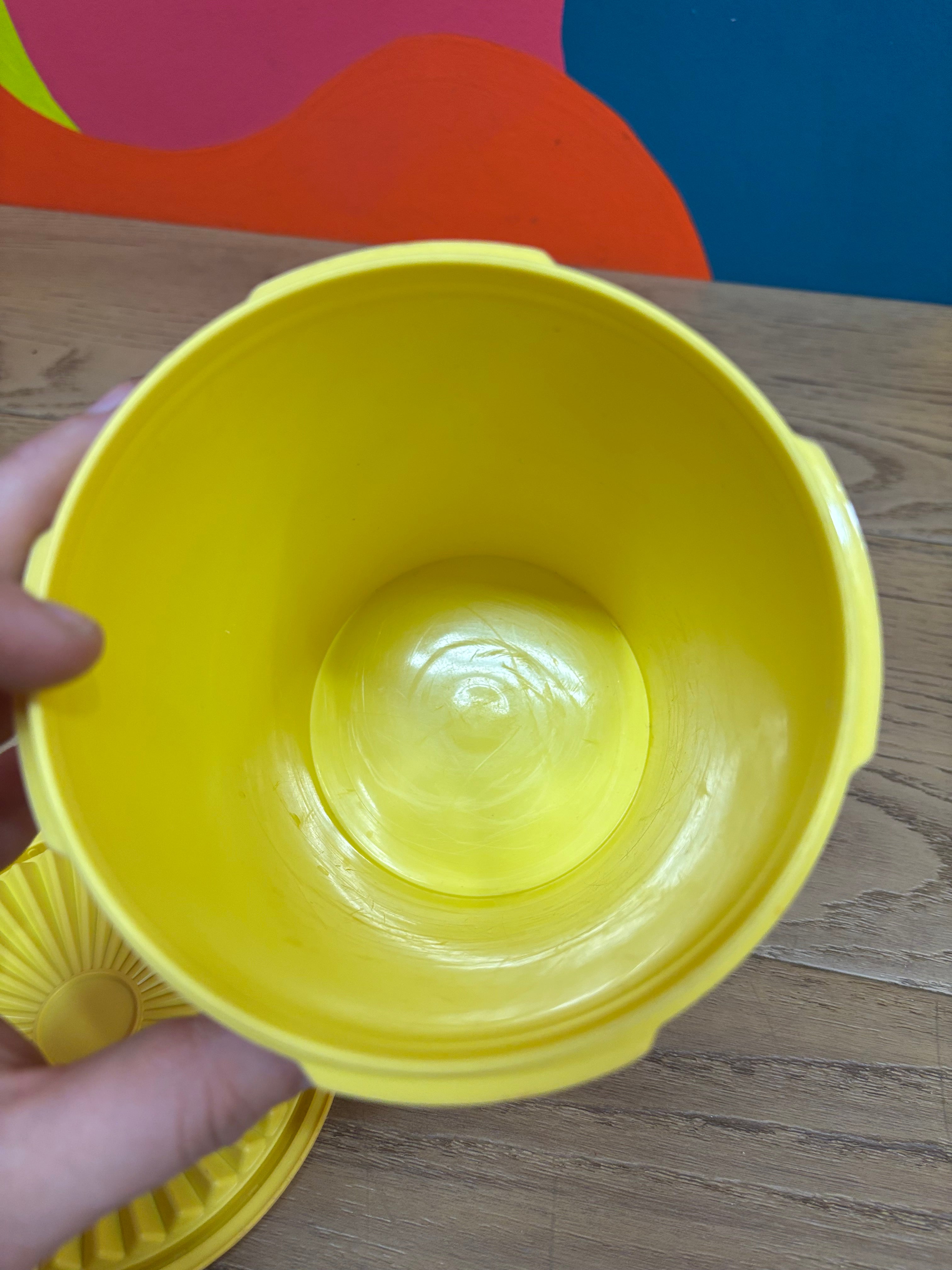 Yellow Tupperware Canister