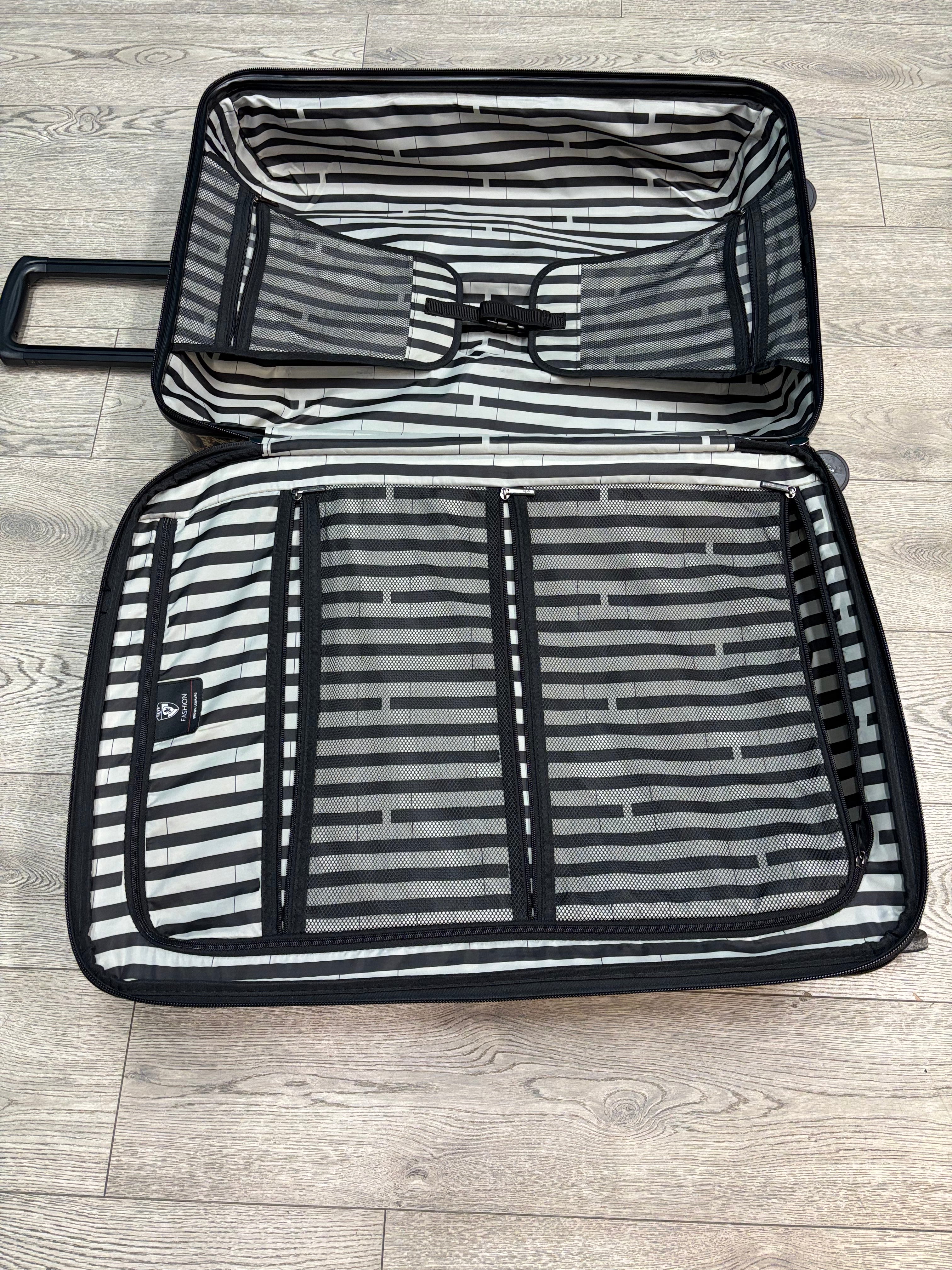 HEYS Leopard Fashion Spinner Luggage