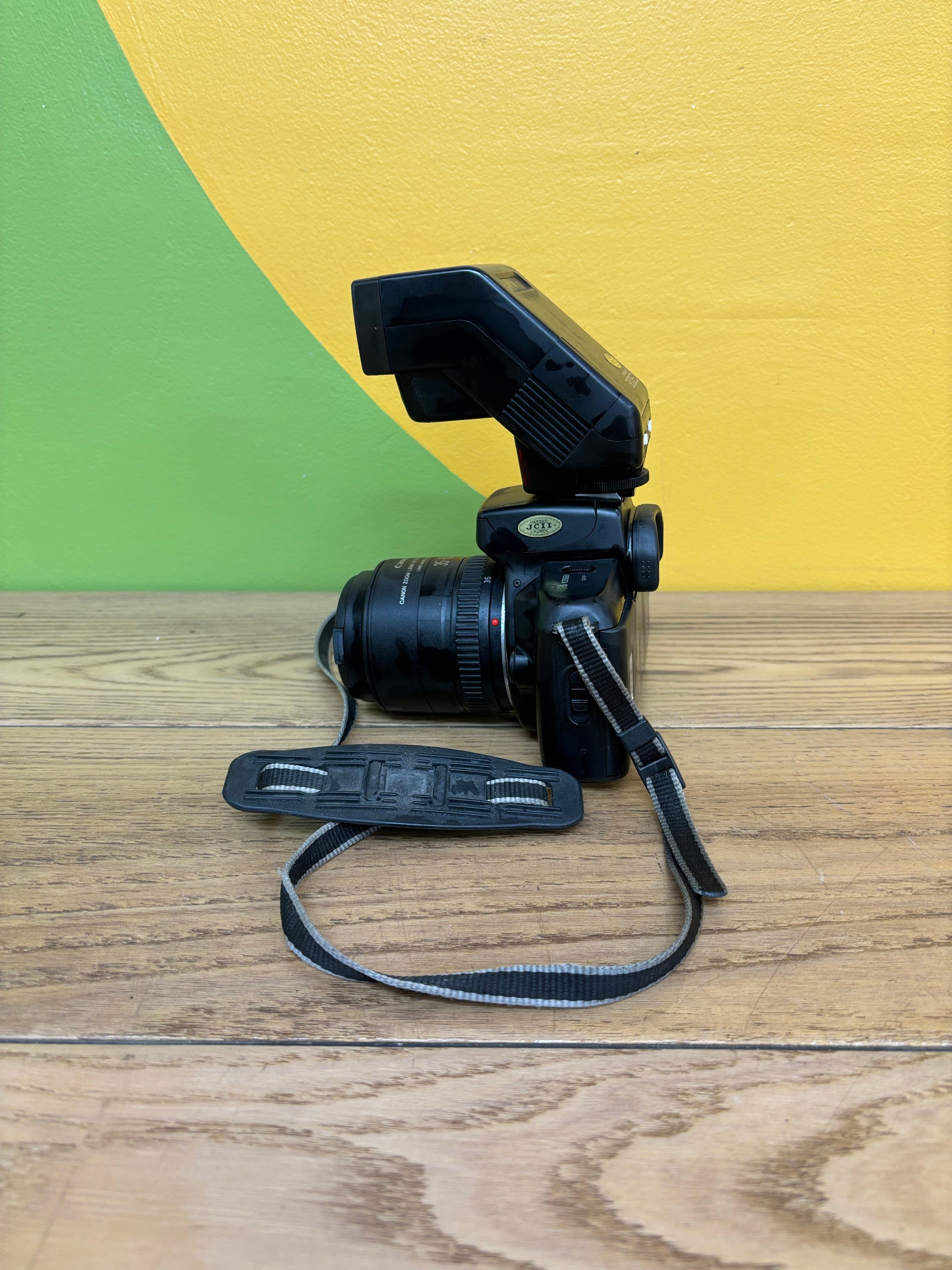 Canon EOS 750 Film Camera with Speedlite 300EZ Attached Flash