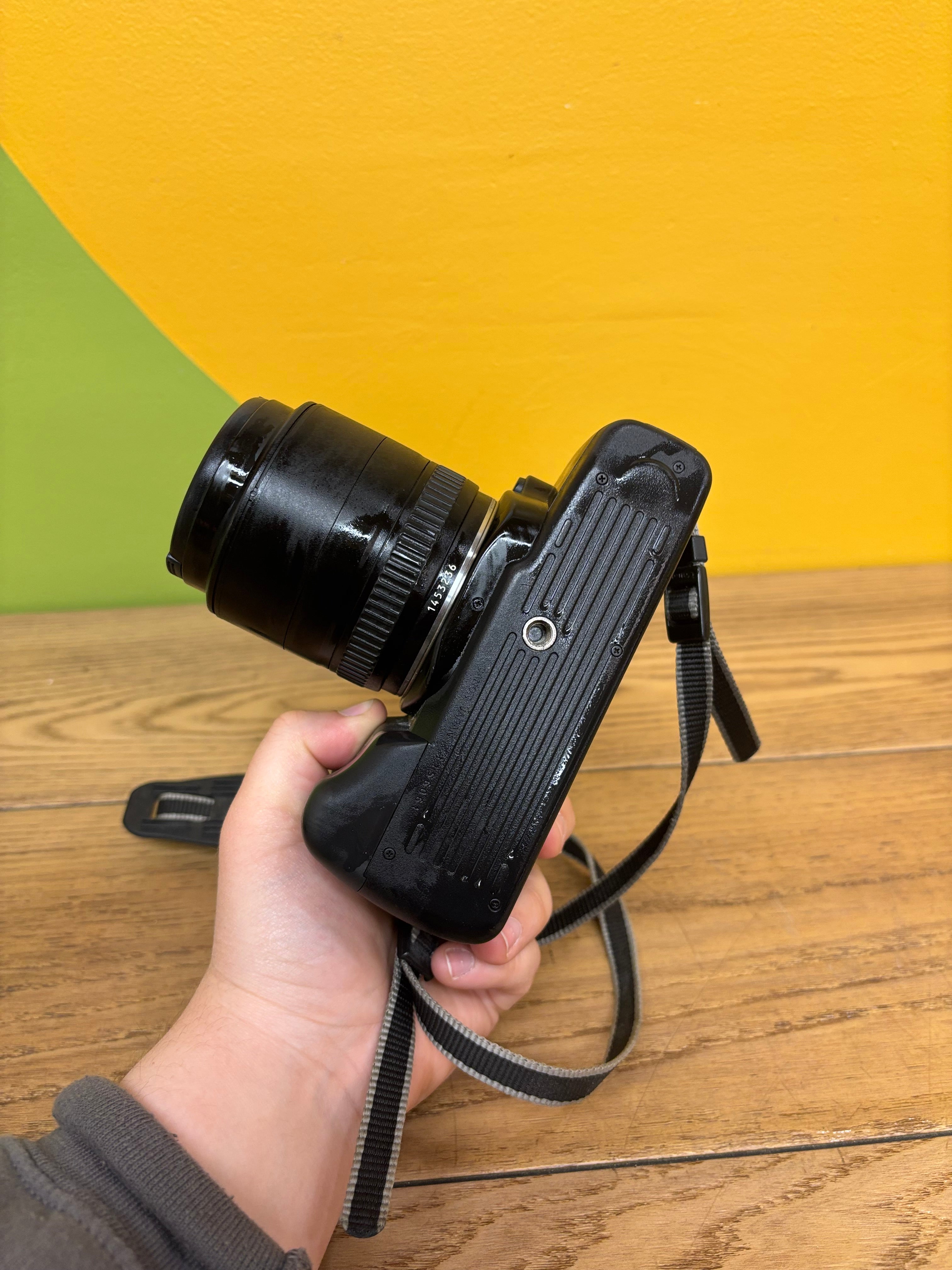 Canon EOS 750 Film Camera with Speedlite 300EZ Attached Flash