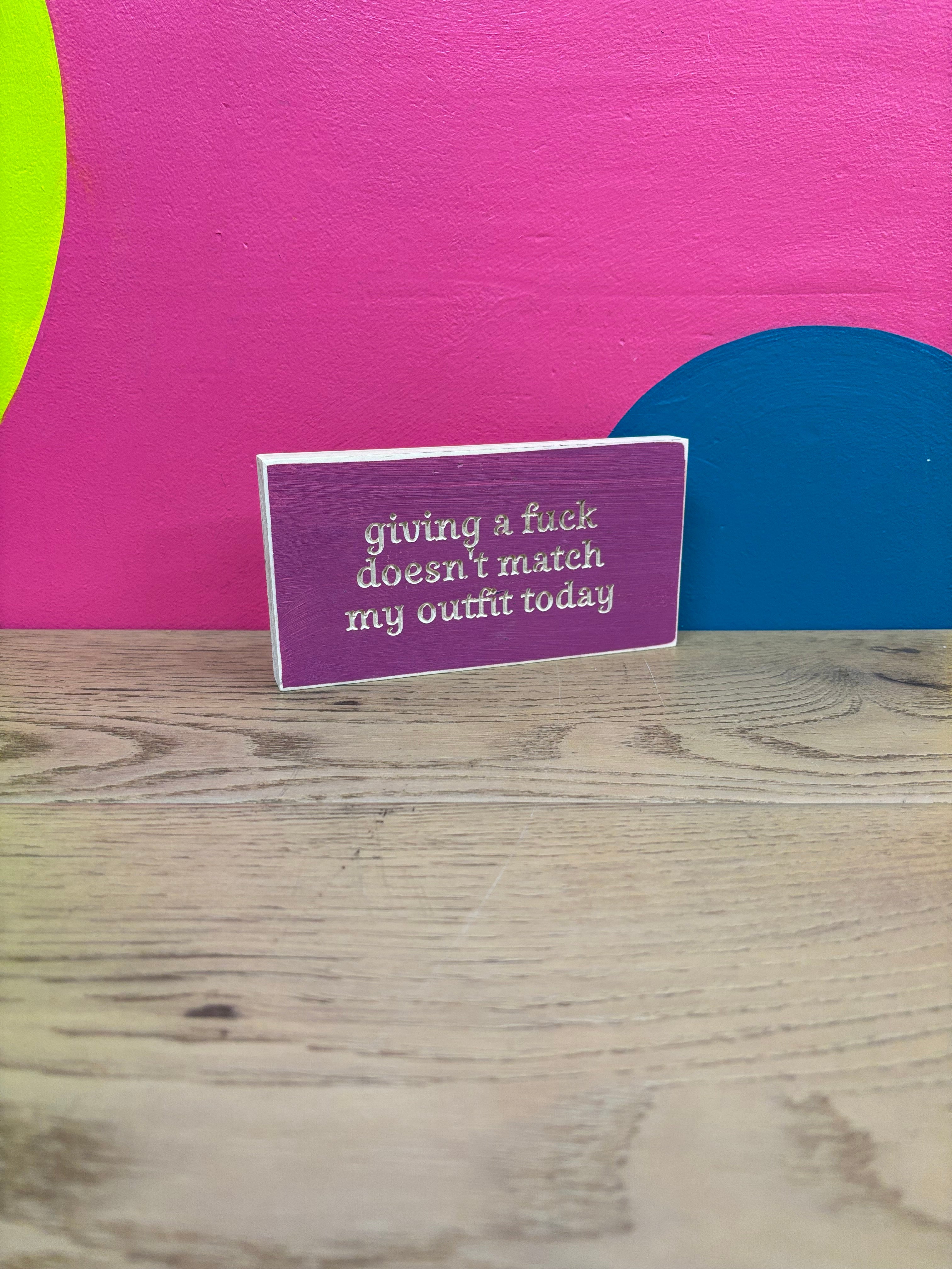 "giving a f*** doesn't match my outfit" Wood Sign