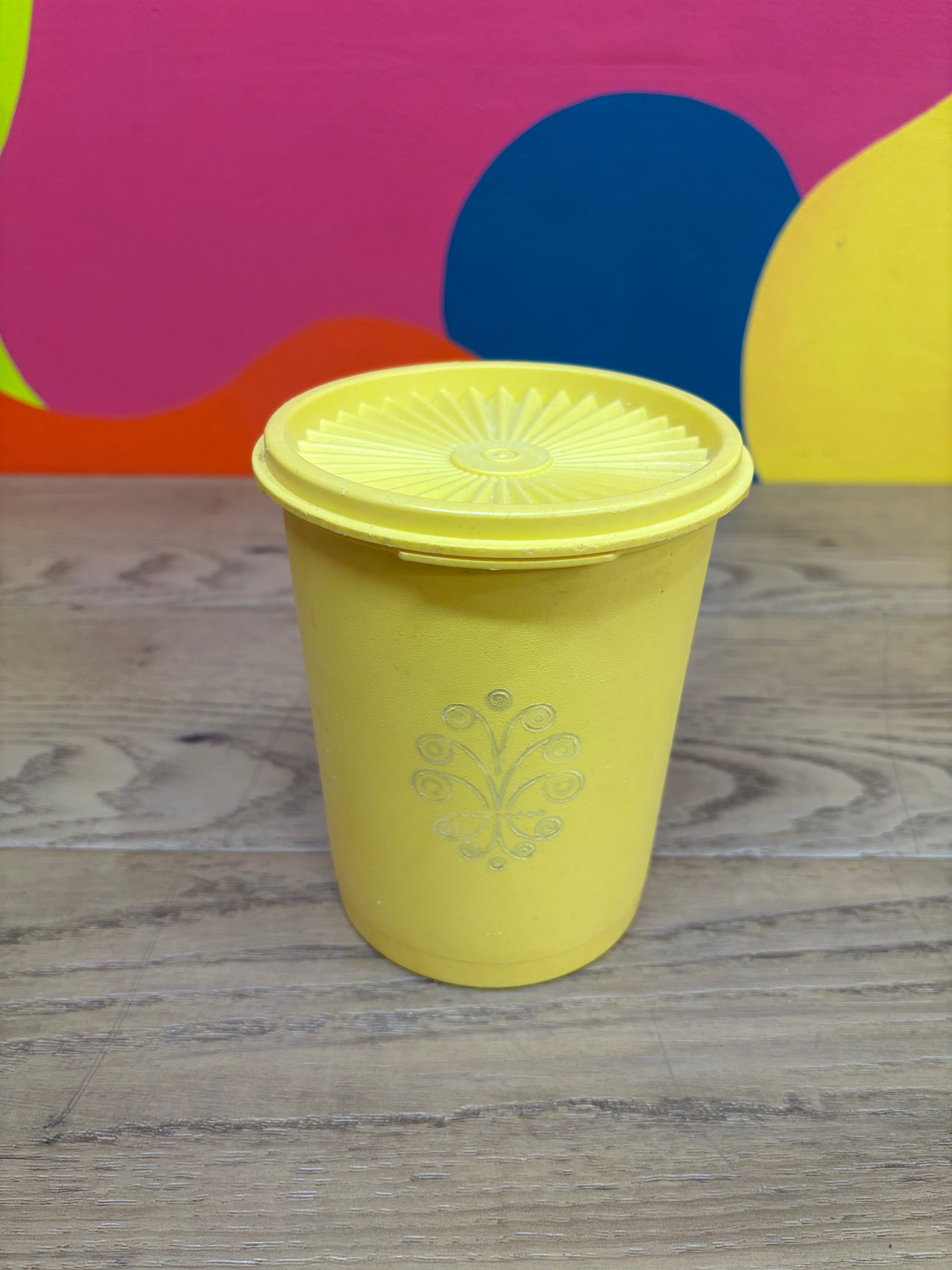 Yellow Tupperware Canister