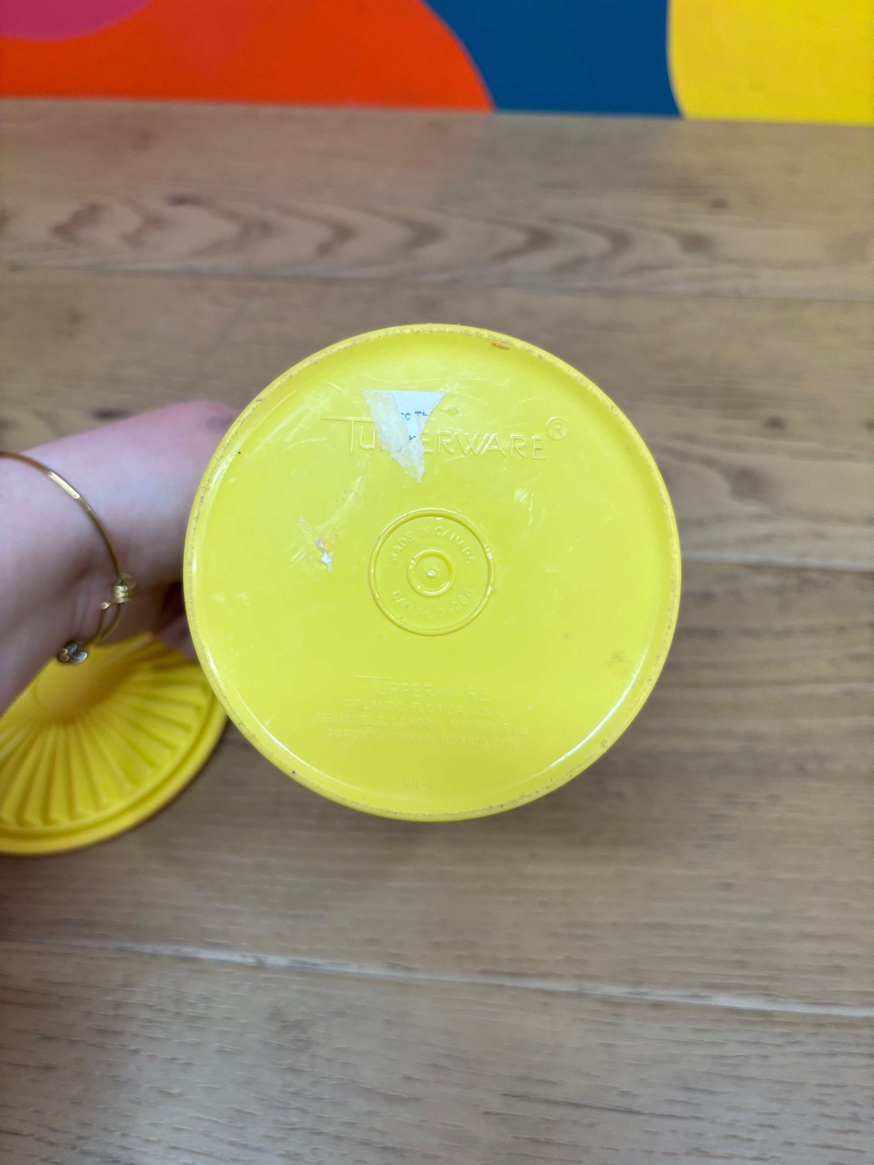 Yellow Tupperware Canister