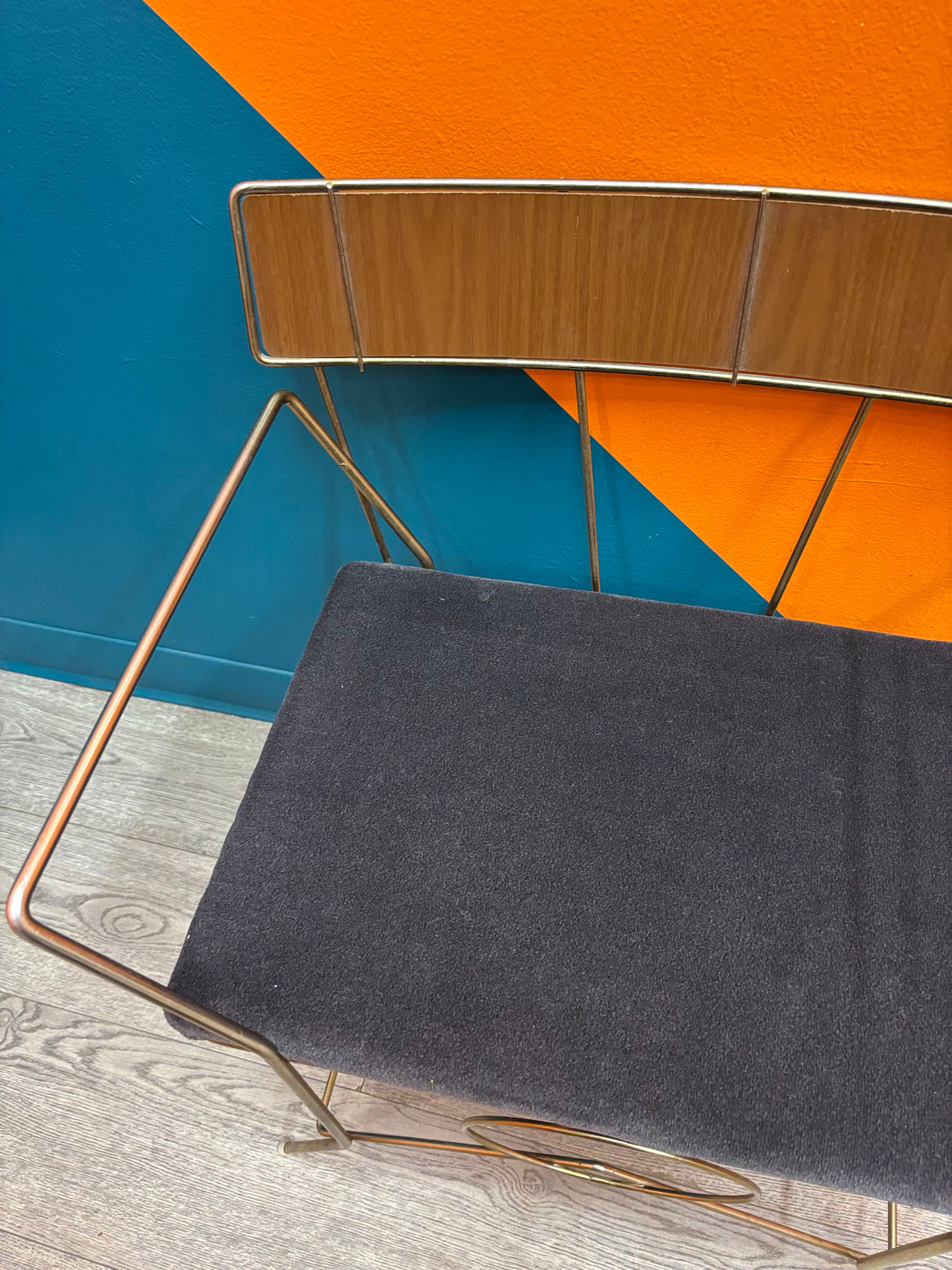Metal Gossip Bench with Magazine Rack