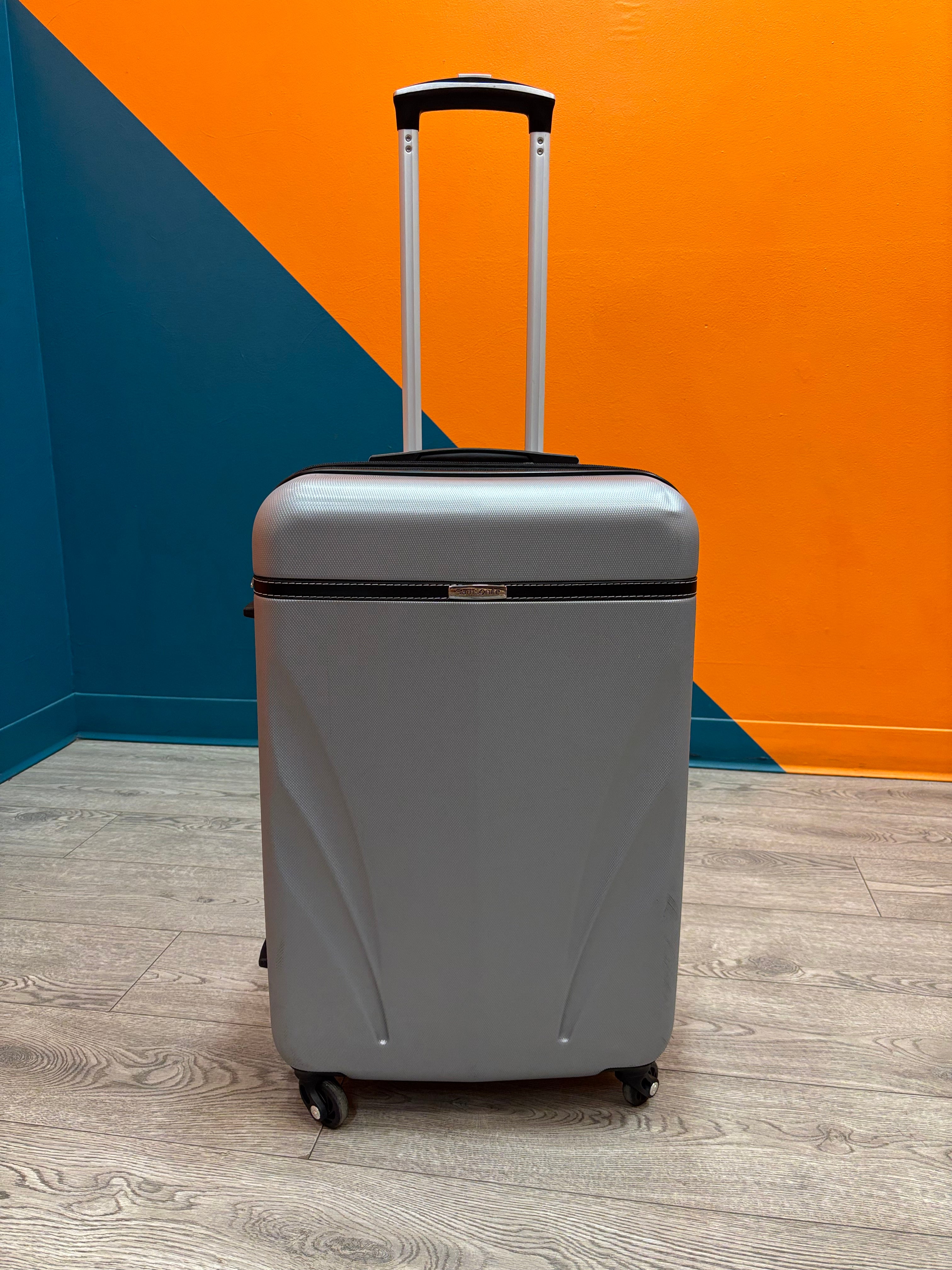 Grey Rolling Suitcase (Samsonite)