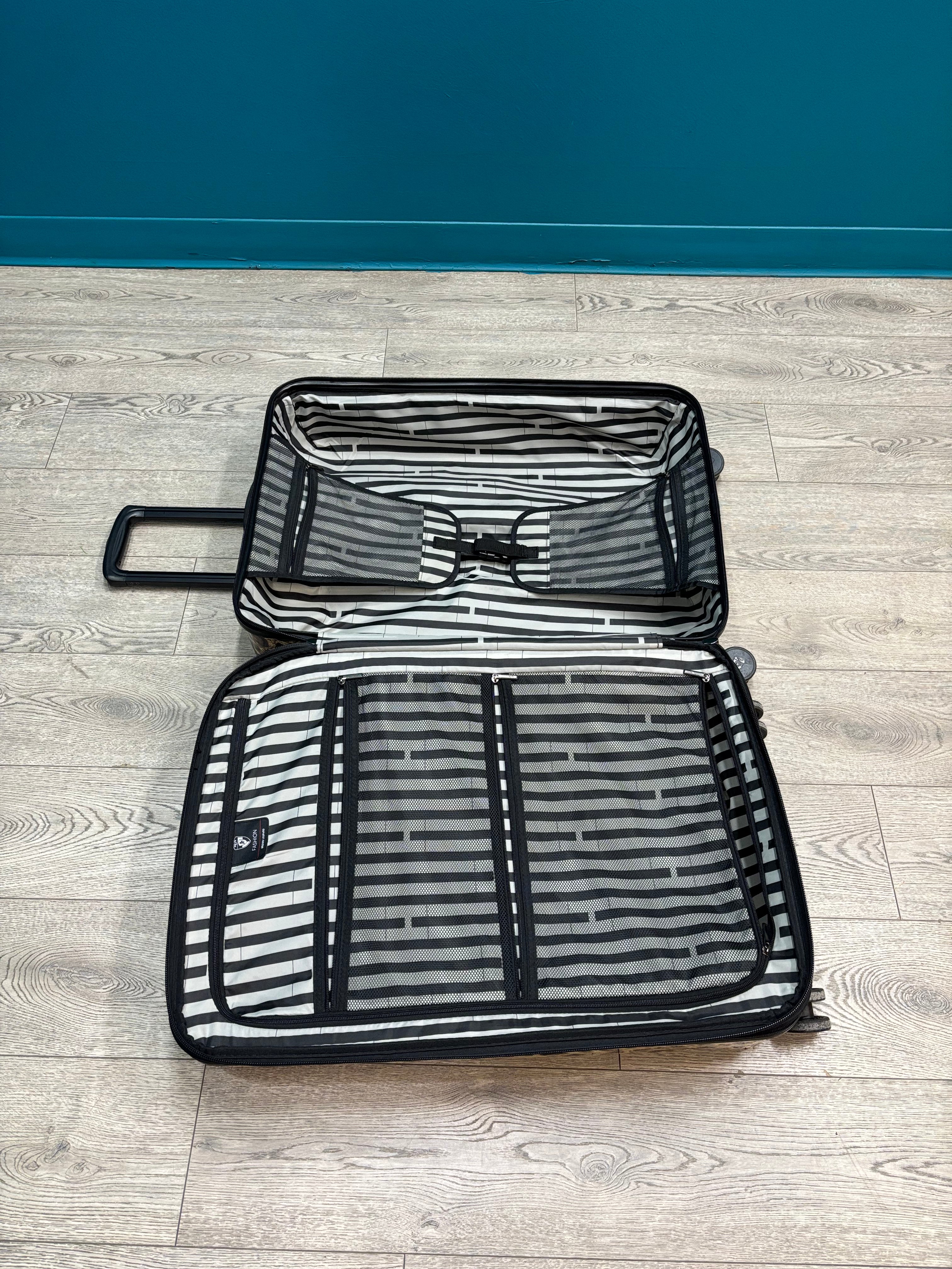 HEYS Leopard Fashion Spinner Luggage