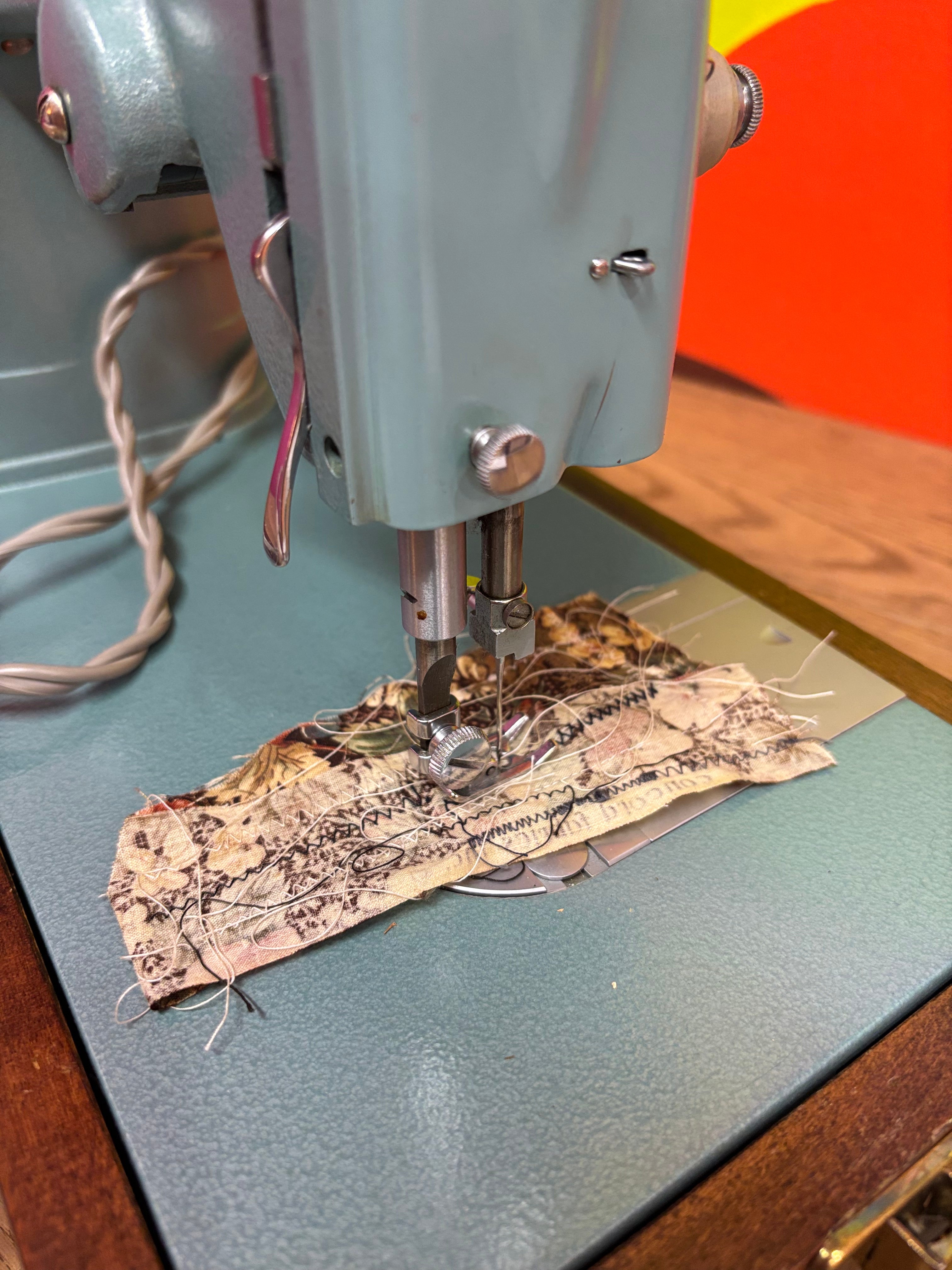 Teal Singer Sewing Machine in Carrying Case