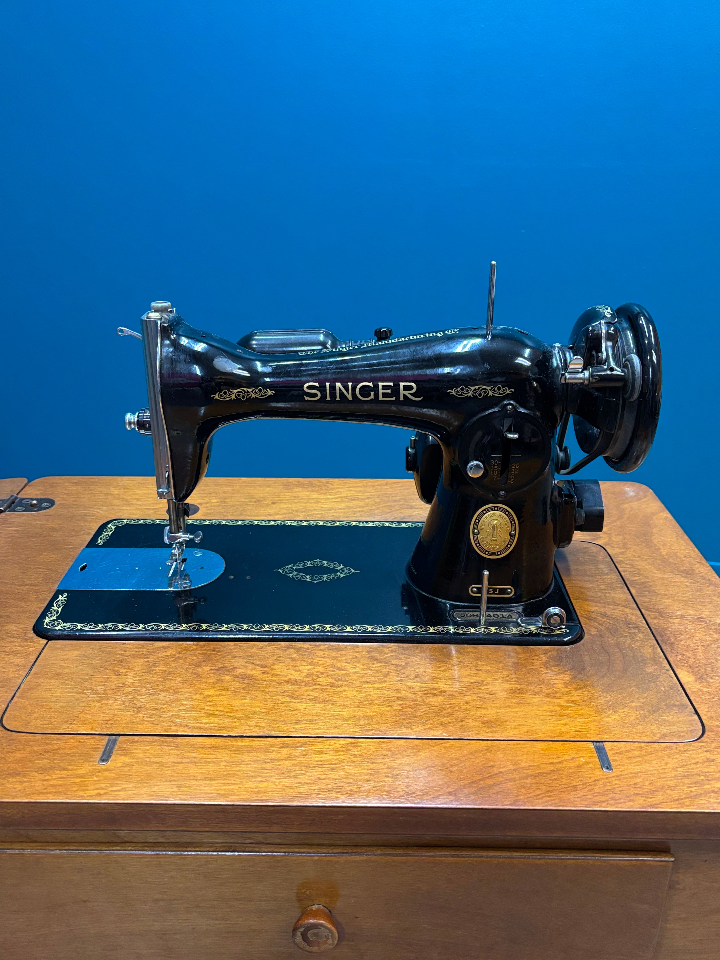 Singer Sewing Machine & Cabinet