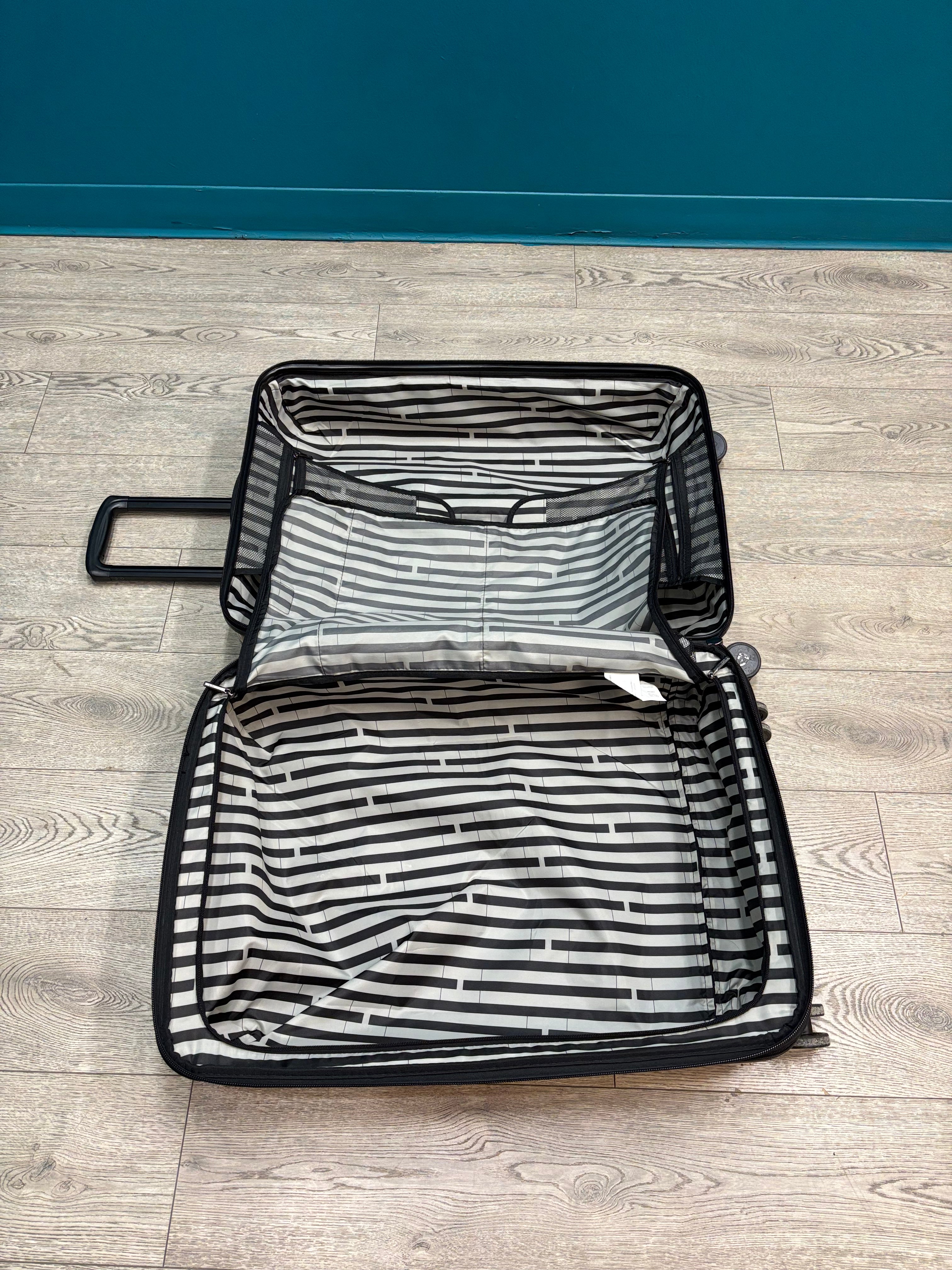 HEYS Leopard Fashion Spinner Luggage