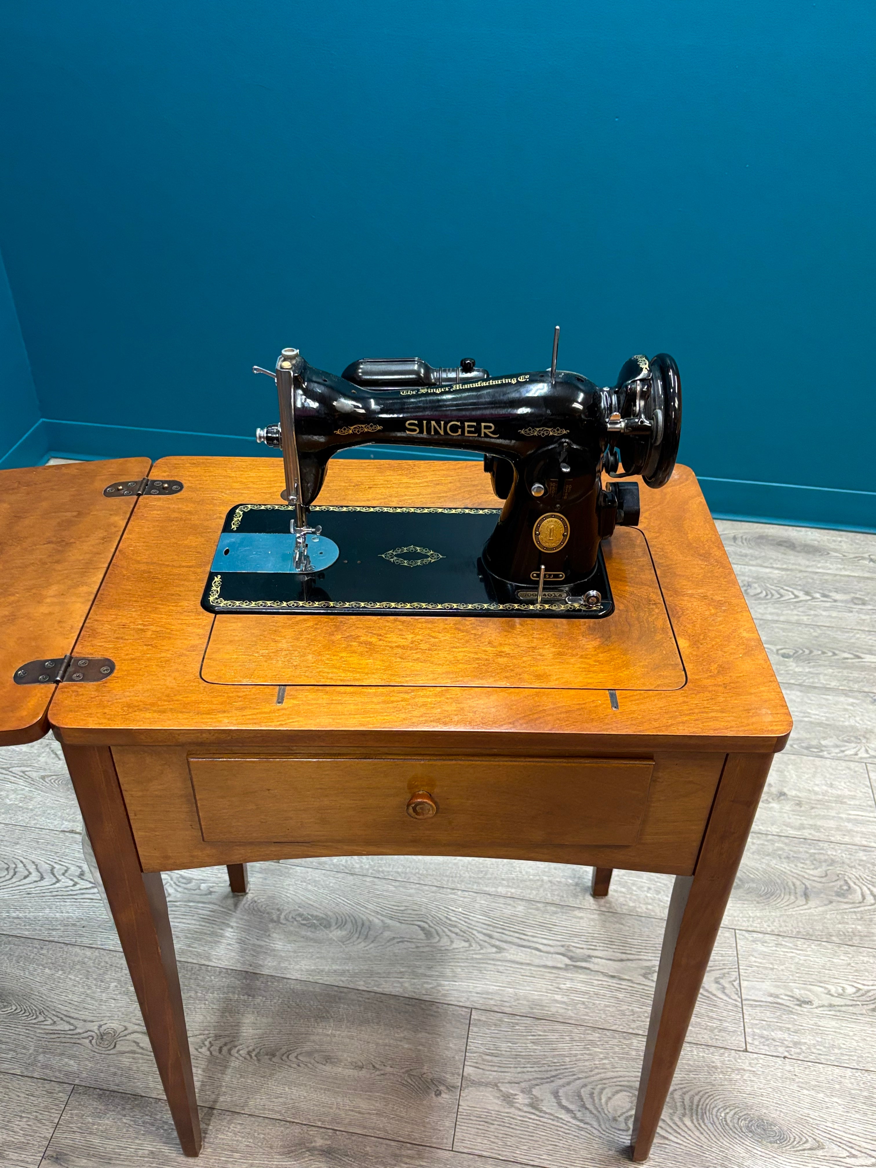 Singer Sewing Machine & Cabinet