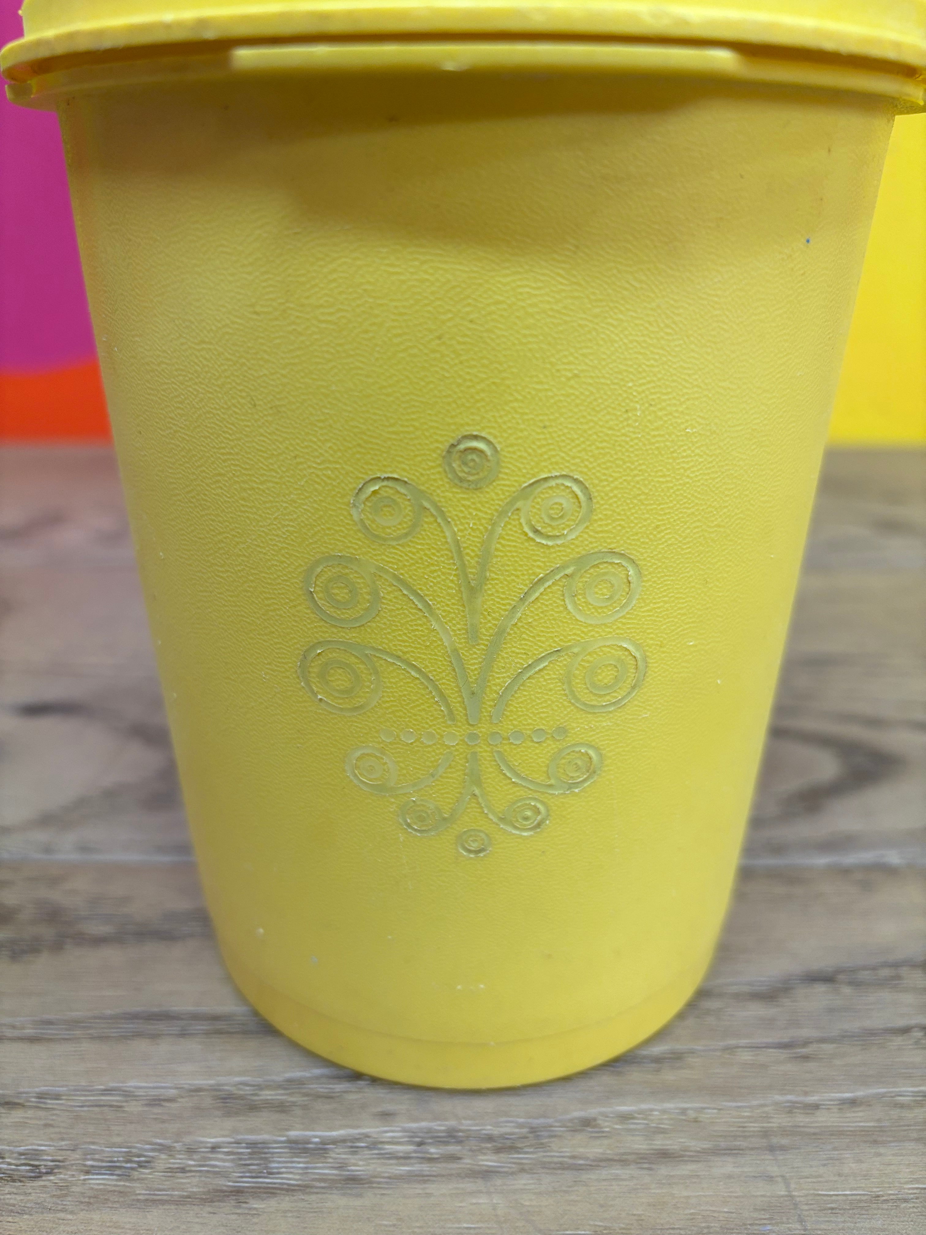Yellow Tupperware Canister