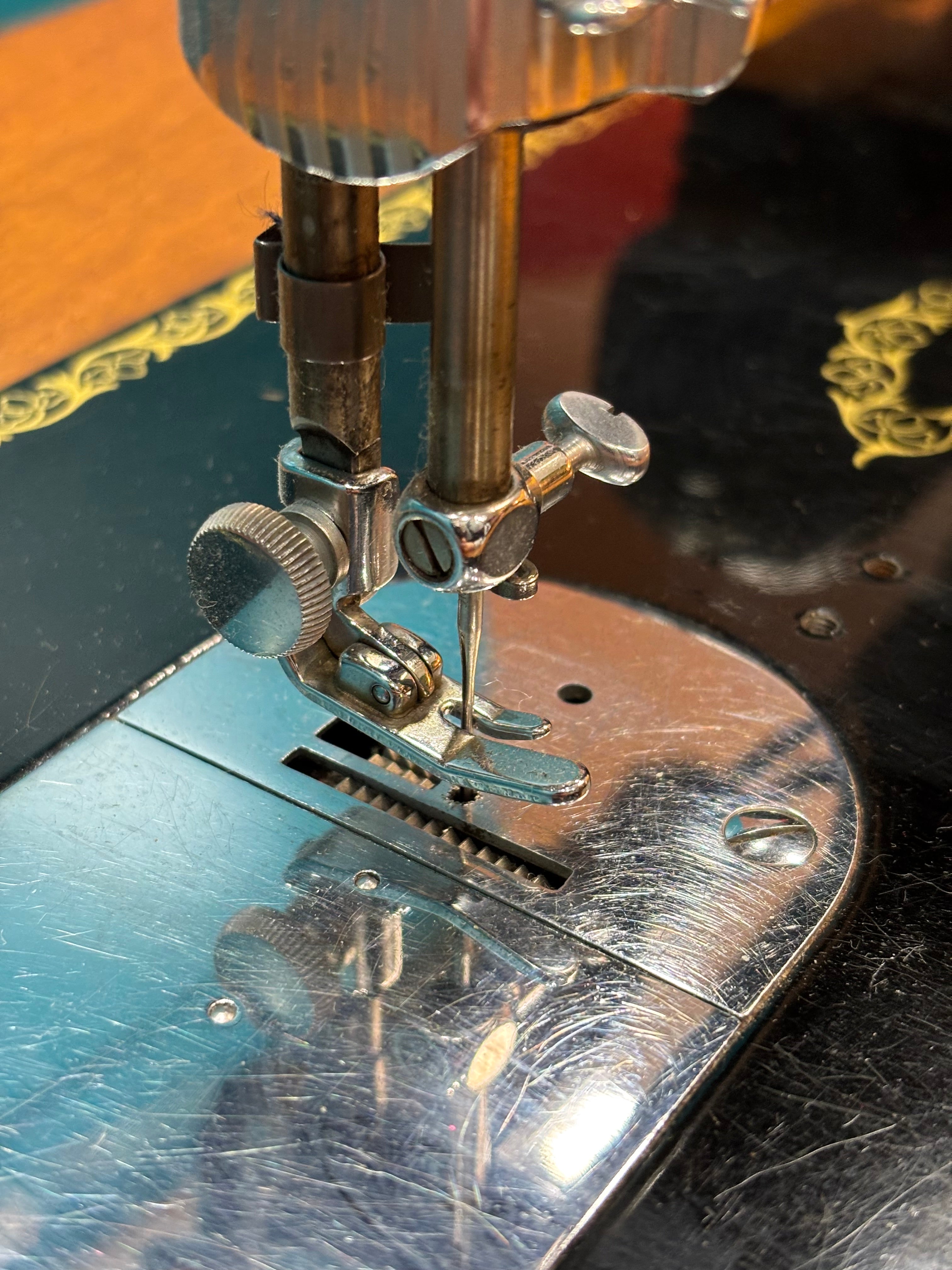 Singer Sewing Machine & Cabinet