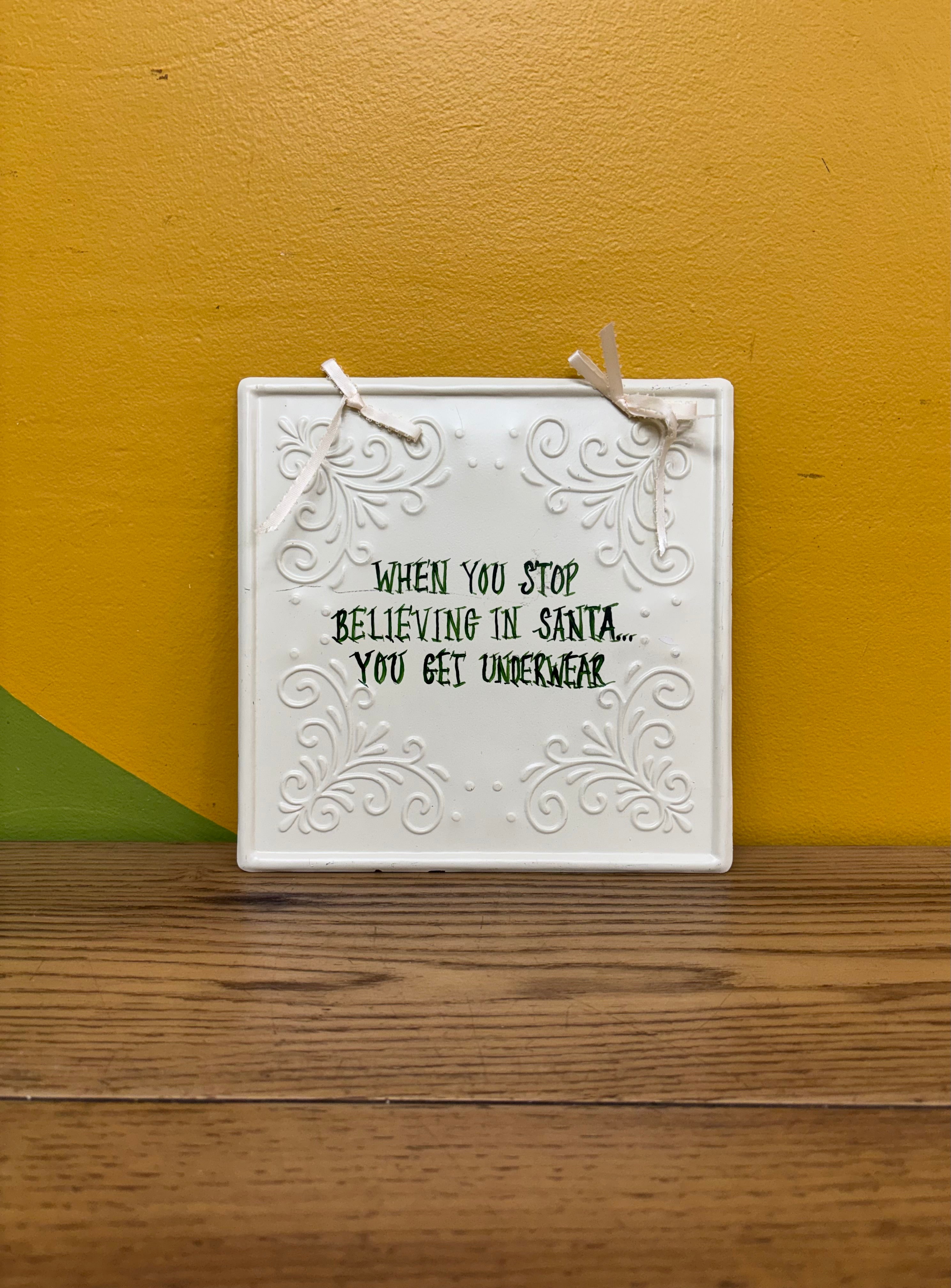 “When you stop believing in Santa… you get underwear” Sign