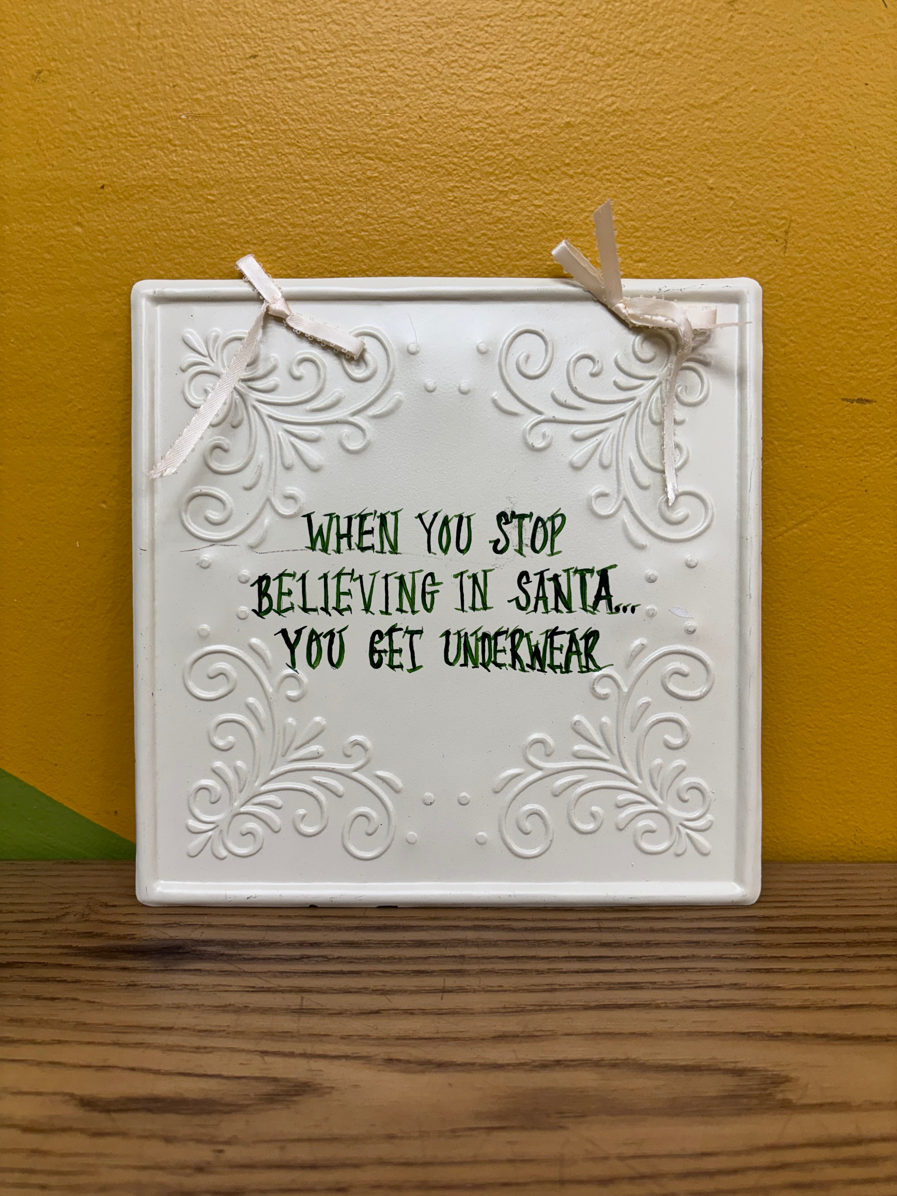“When you stop believing in Santa… you get underwear” Sign
